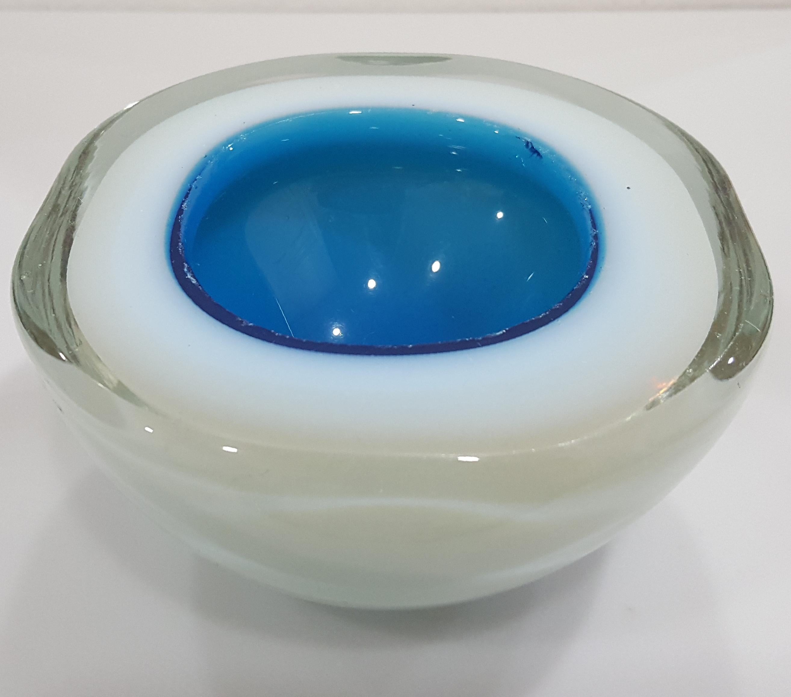 Murano Glass Triple Cased Geode Bowl likely by Cenedese or Seguso, blue/white.
*****NOTICE: Our 1stDibs shop will be taking a break soon, thus the temporarily lower price.*****
It measures about 5