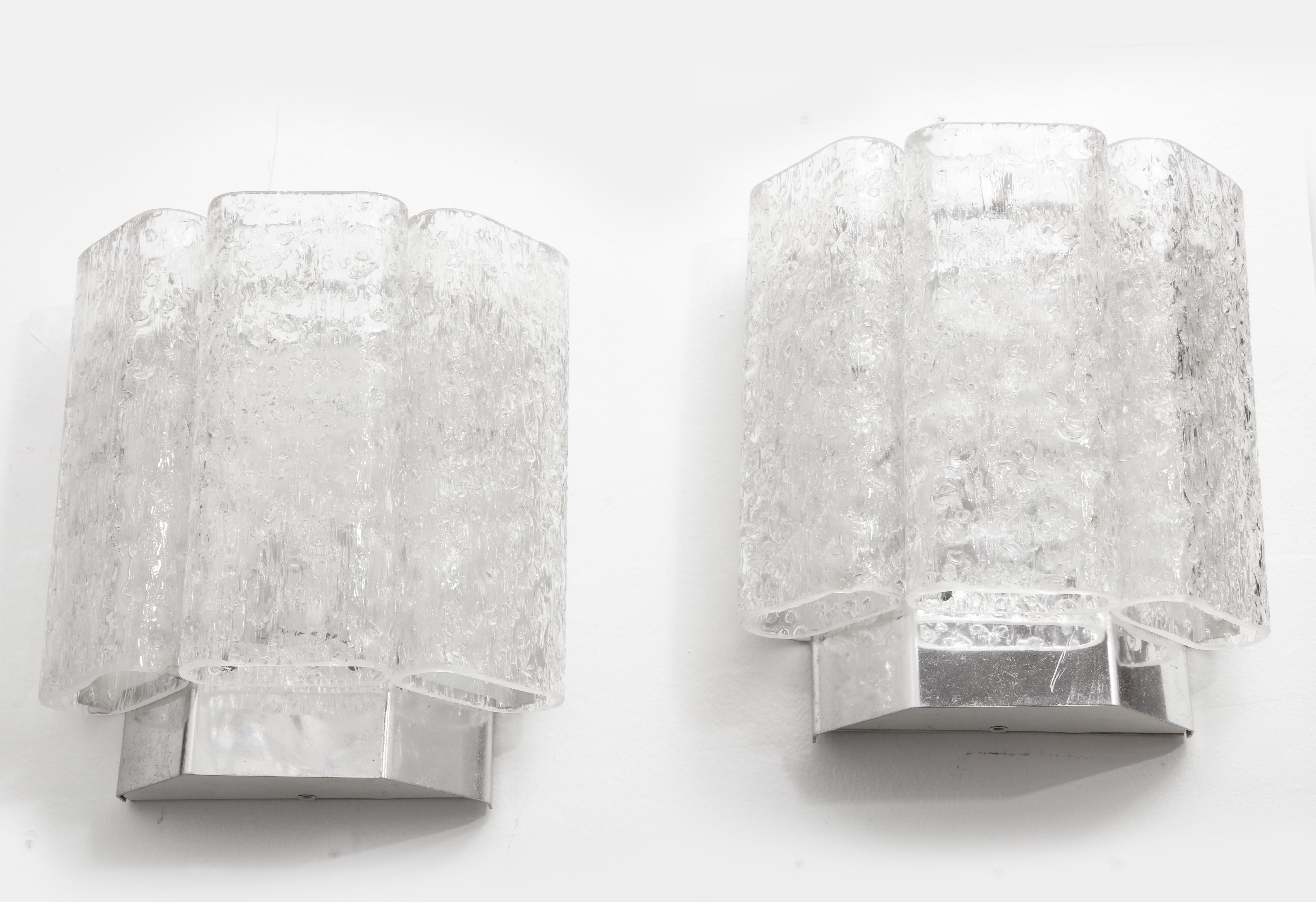 Pair of Murano glass sconces featuring 3 oblong shaped tubes with chromed backplates. Glass has a internal bubbles giving them an ice block effect. Rewired for use in USA.
