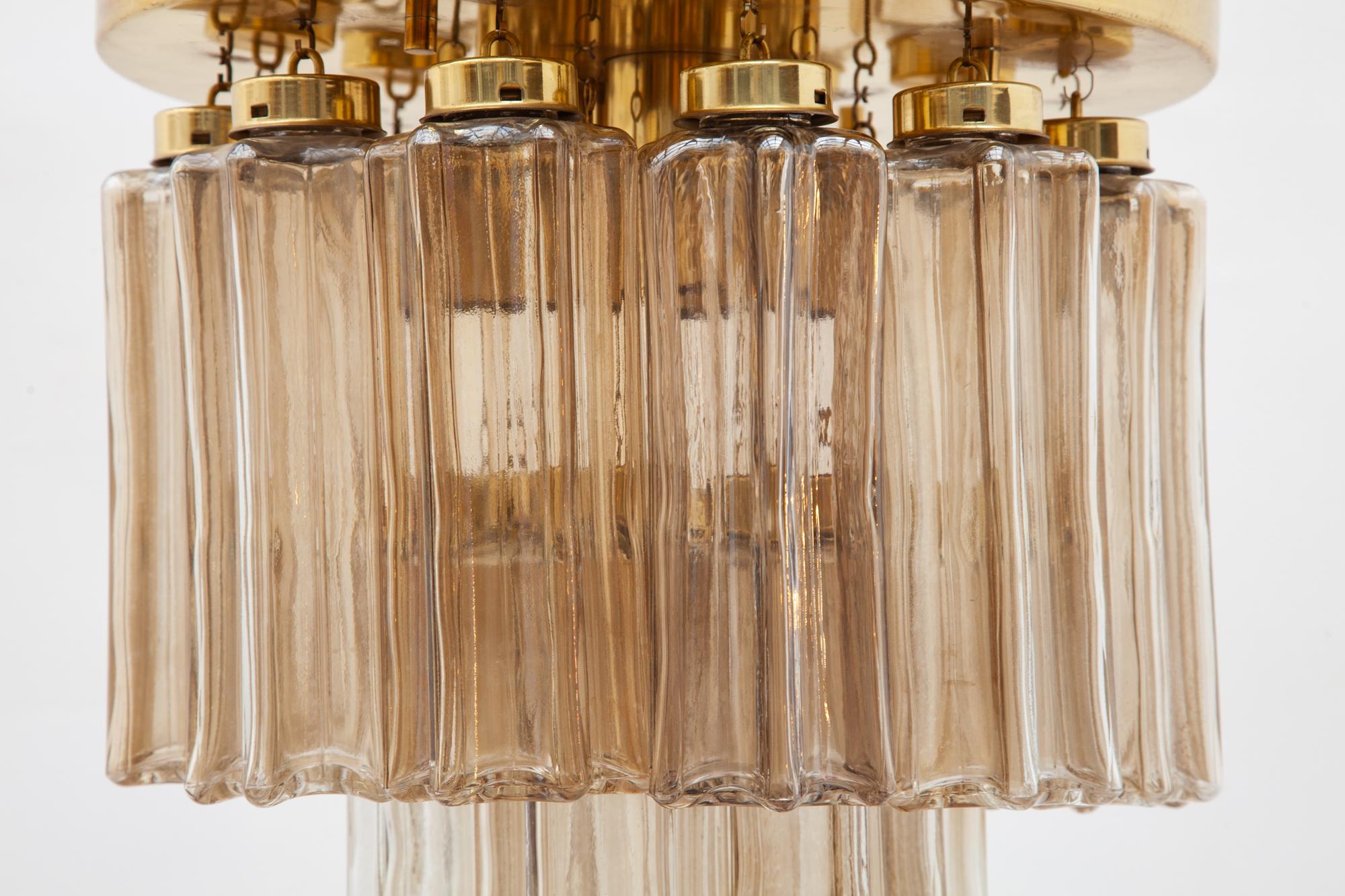 Limburg Murano two tiers of star-shaped clear beige glass tubes flush mount chandelier each with brass fittings and brass ceiling plate. Manufactured by Limburg Glashutte 1970, Germany. Lit by 4 bulbs.