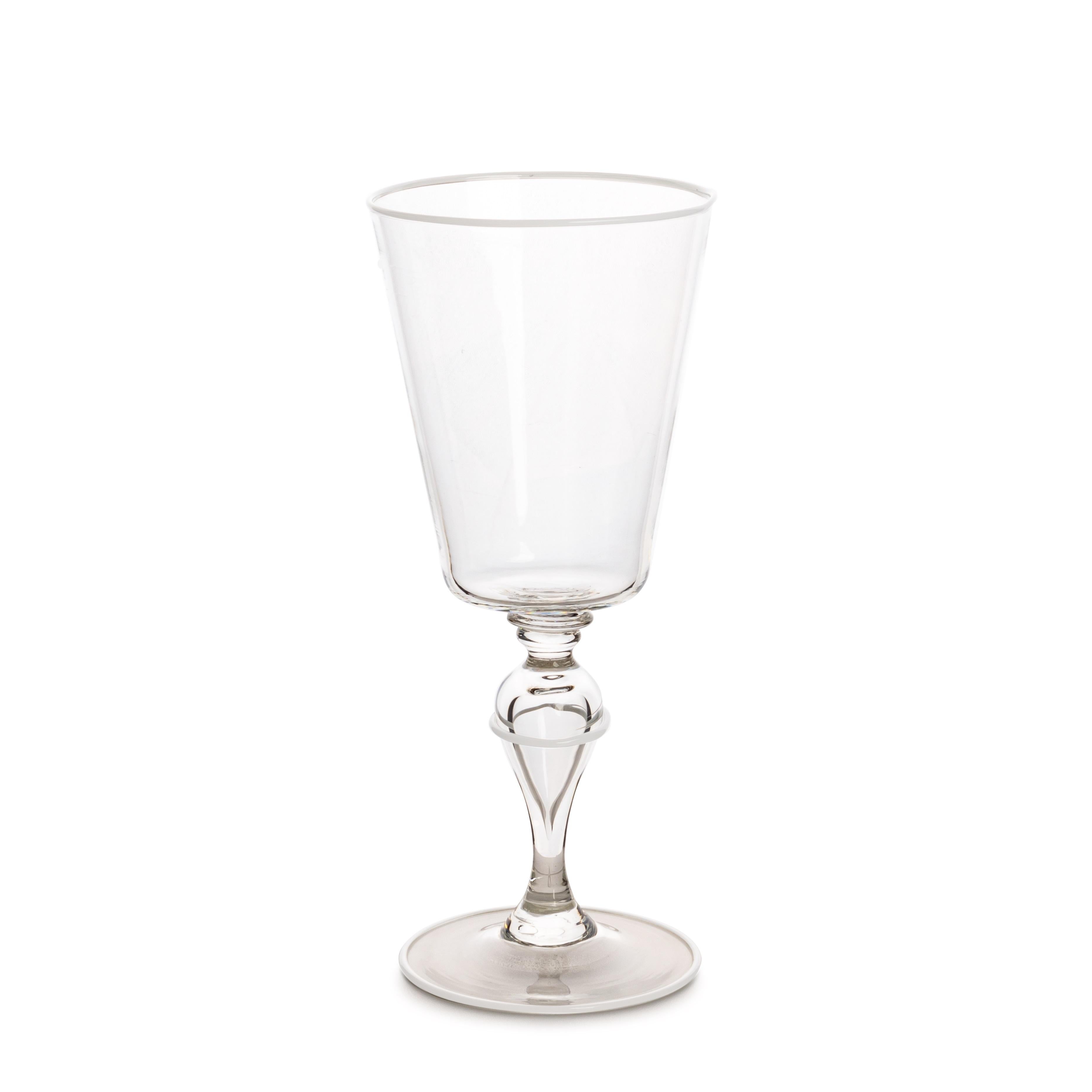 This collection was born from our meeting with an incredible glass master on the island of Murano in Venice. This Maestro is one of the last specialized only in goblets and tumblers made entirely by mouth and hand. No molds are used and the parts of