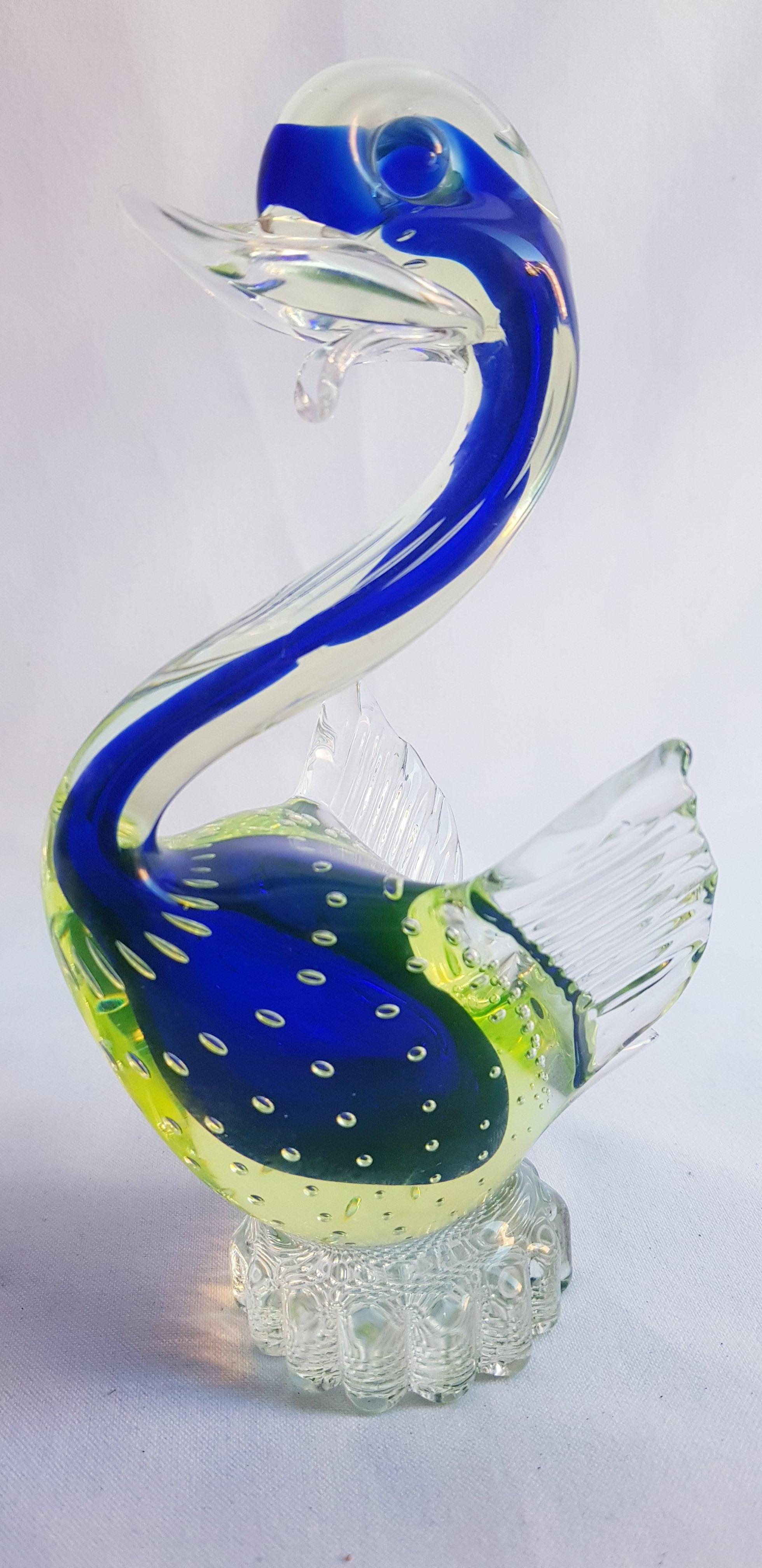 Beautiful Murano glass uranium bird in blue and uranium green with controlled bubbles by Galliano Ferro for Vetri Cenedese; years 1950-1960. In excellent condition.