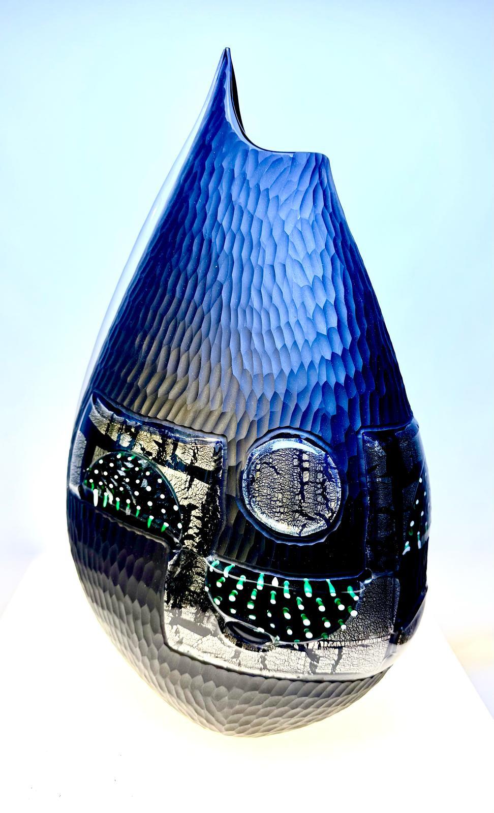 Bellissimo vaso in vetro di Murano disegnato e prodotto da Afro Celotto nel 2011.

I vasi in vetro di Murano di Celotto sono molto ricercati da collezionisti e arredatori. 
I suoi vasi sono noti per la loro bellezza, la maestria e l'uso di colori
