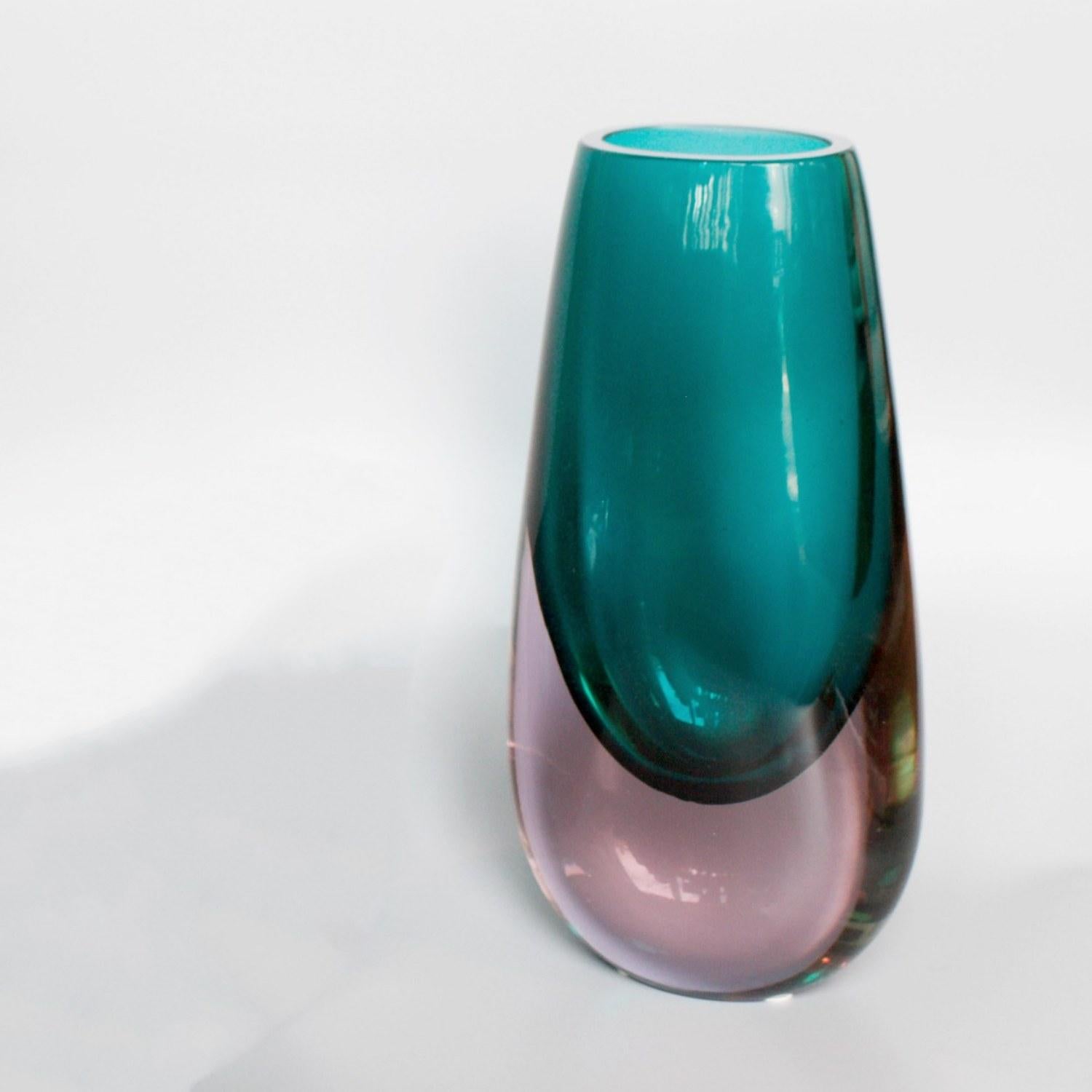 A lavender and green glass Murano vase by glass master Fabio Tosi & Antonio da Ros for Ars Cendese glass company in Murano, Italy.

Dimensions: H 32cm, W 15cm, D 7.5cm

Origin: Italy

Date: circa 1960

Gino Cenedese (1907-1973) established