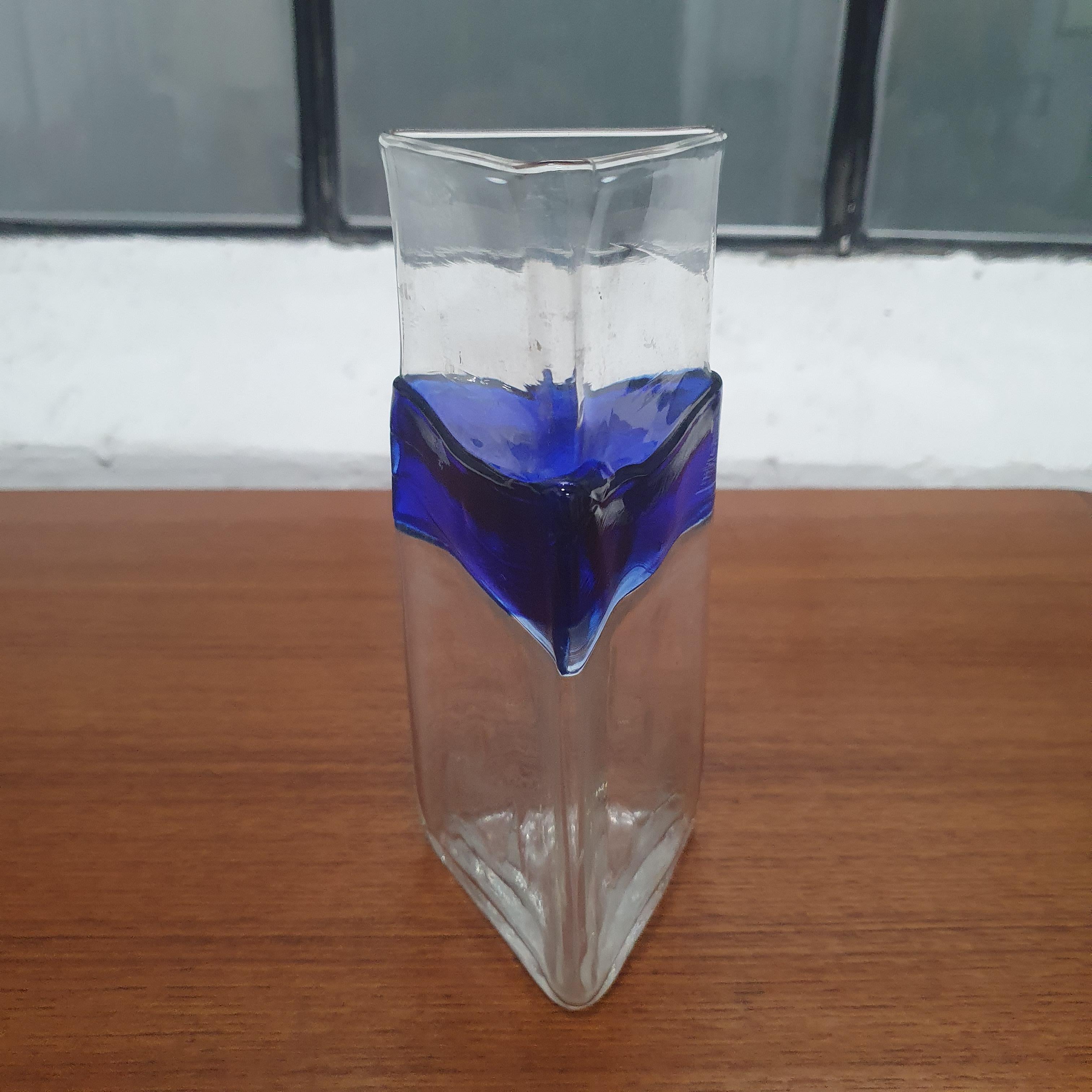Murano glass vase by Carlo Nason, signed '99.

Triangle shaped, 3.25 in x 7.5 in high.