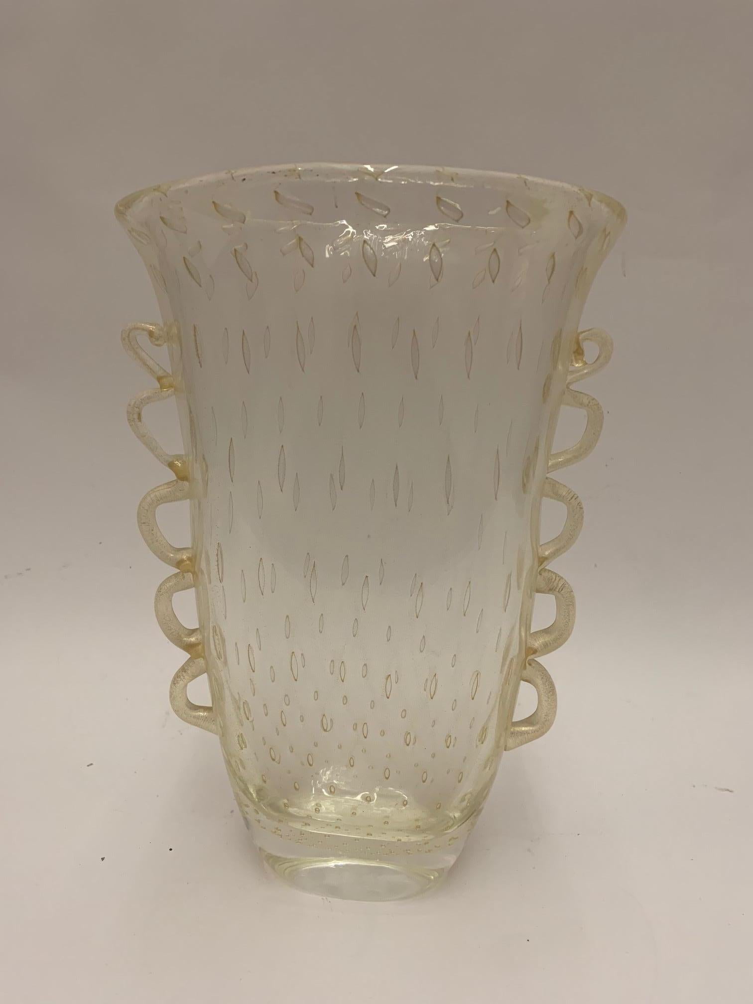 Hand blown Murano glass vase in rare pale yellow hue.

Property from esteemed interior designer Juan Montoya. Juan Montoya is one of the most acclaimed and prolific interior designers in the world today. Juan Montoya was born and spent his early