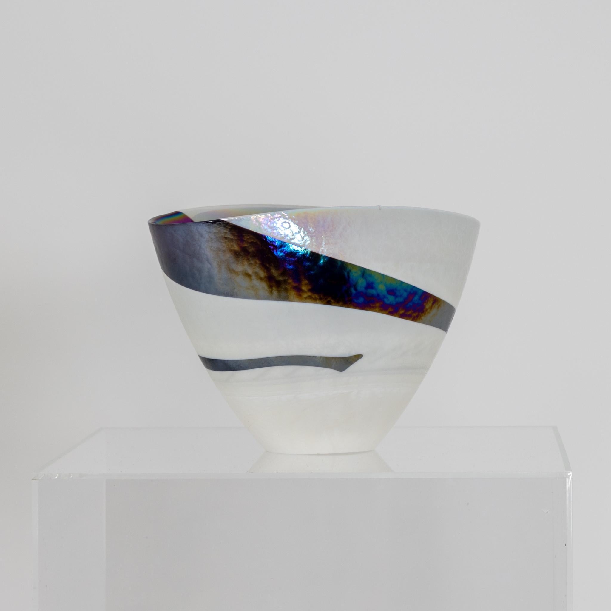 Murano glass vase with smooth wall in conical shape and iridescent dark inclusion. Label on the inside.