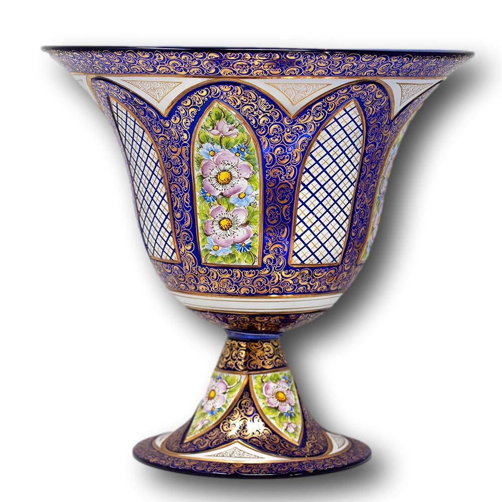 Fine and large Murano glass jardiniere dating to the second half of the 20th century. The Jardiniere made with blue glass having a wide-open trumpet shape mouth tapering to a pinched mounted foot with flared base. The jardiniere featuring Gothic