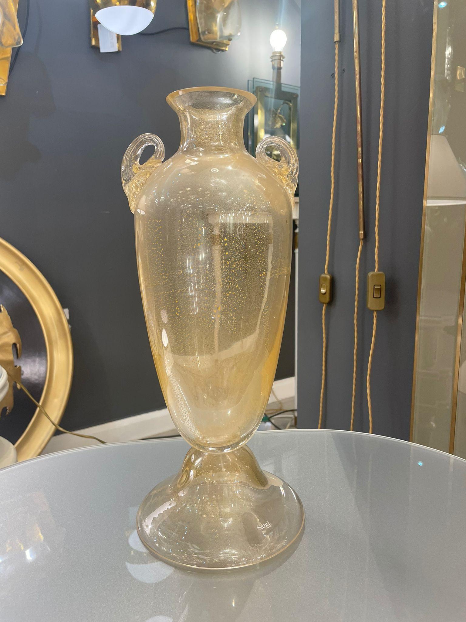 A stunning Murano glass vase in the shape of an amphora, in clear glass with gold inclusions.
 Signed by Santi Murano.