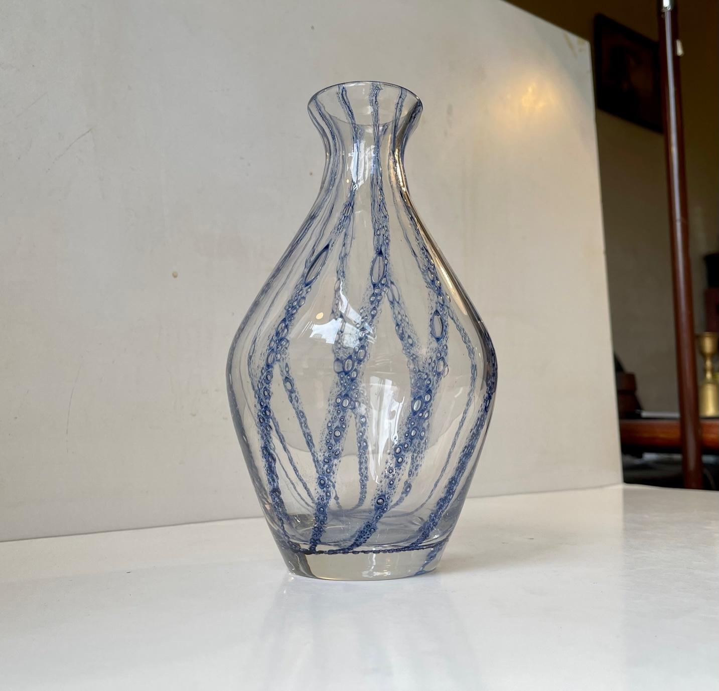 A 1930s Hand-blown clear glass vase with internal blue swirls. Made in Murano Italy during the 1930s or 40s. Distinct Art Deco styling. This designs is attributed to Ercole Barovier. This particular vase does not have any markings to the base.