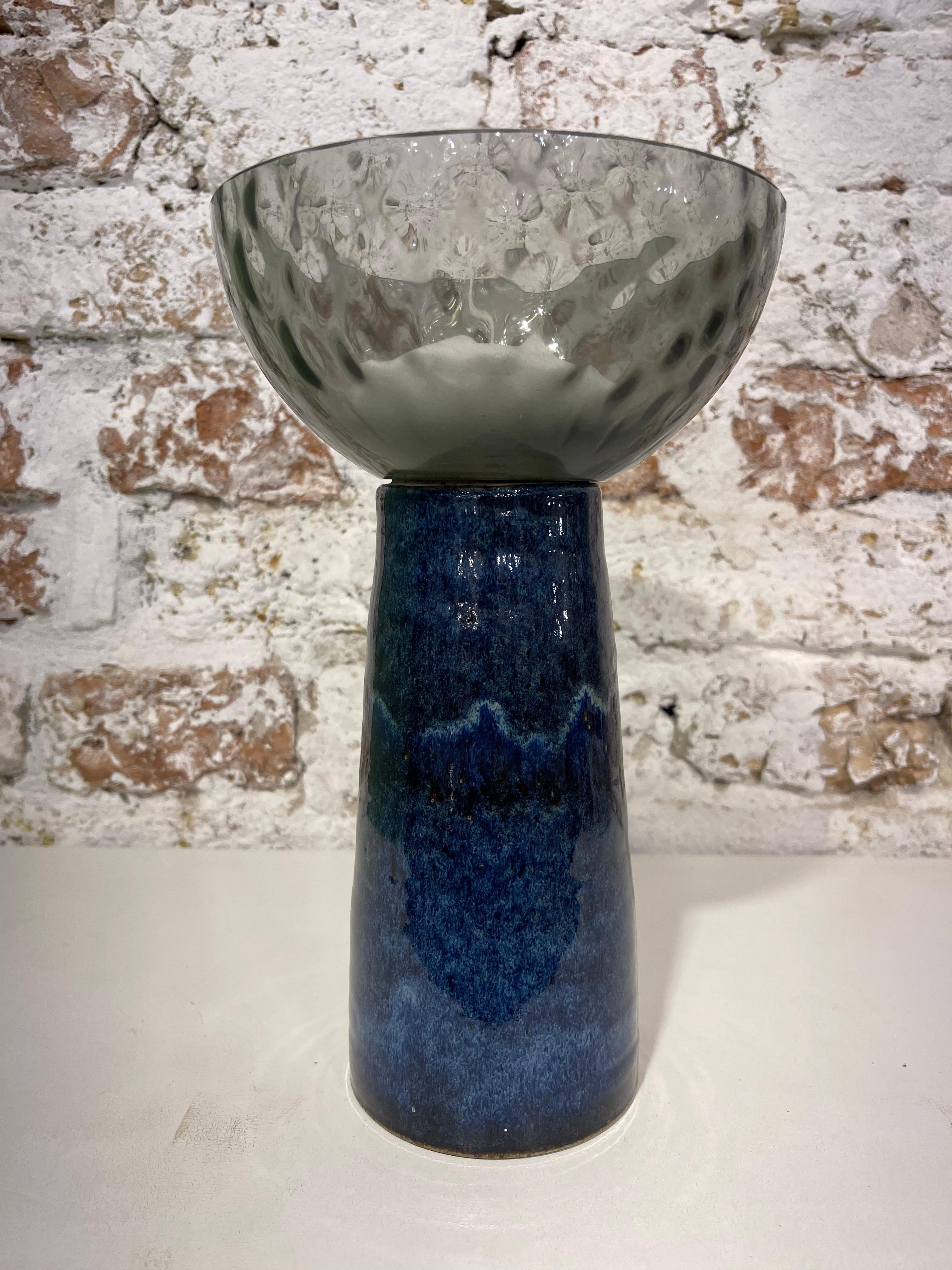 Our vases in Murano glass and dotted white stoneware are entirely handmade with the use of a lathe.u2028After shaping, the jars must dry completely and can be cooked at 1000 degrees. The decoration is performed with ceramic pigment and subsequently