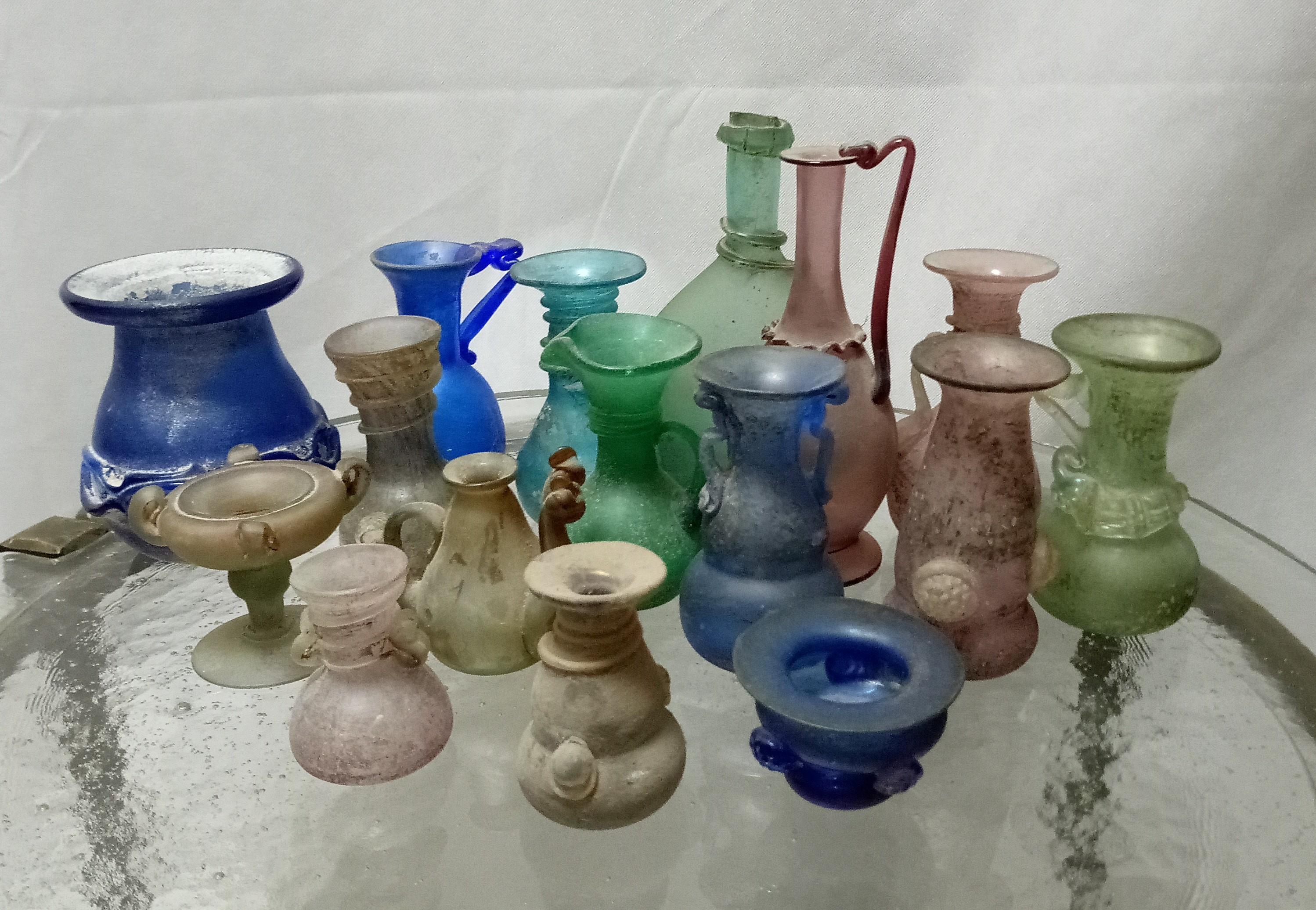 A set of 16 glass vases attributed to Seguso , Murano in different heights. 
The tallest vase is 20 cm high.