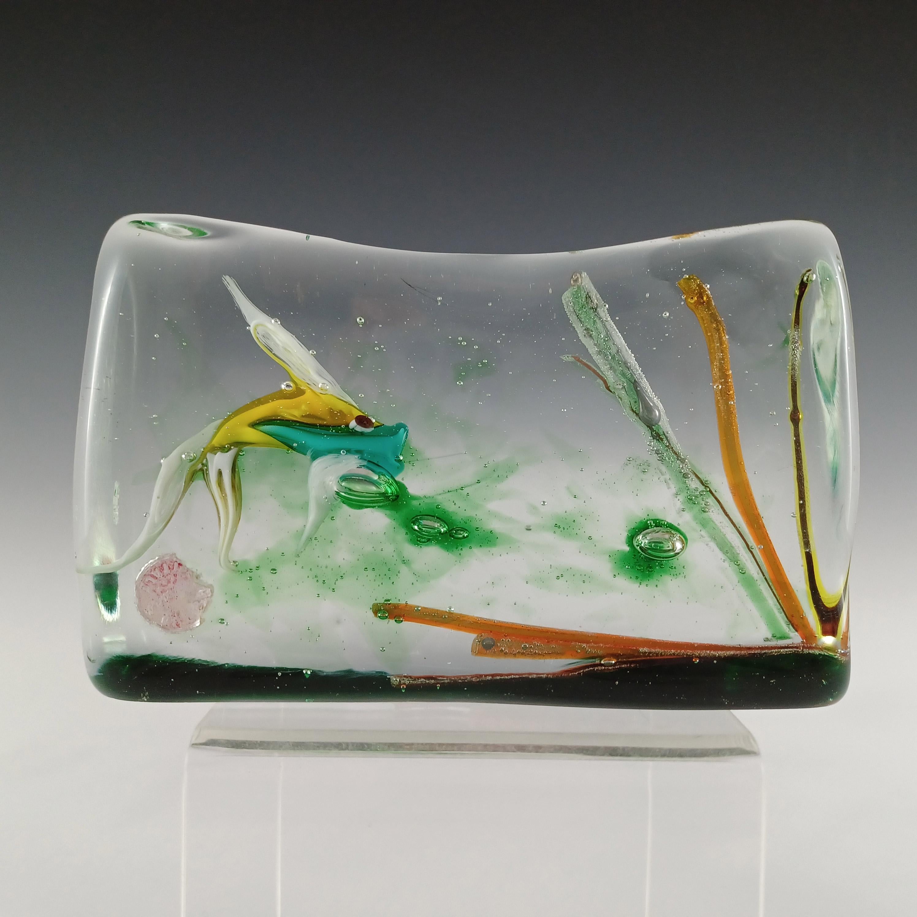 Here is a beautiful 1950/60's Venetian glass fish aquarium block sculpture, made on the island of Murano, near Venice, Italy. Known factories that made these include Barbini, Cenedese, and AVEM. So far I haven't been able to identify which factory
