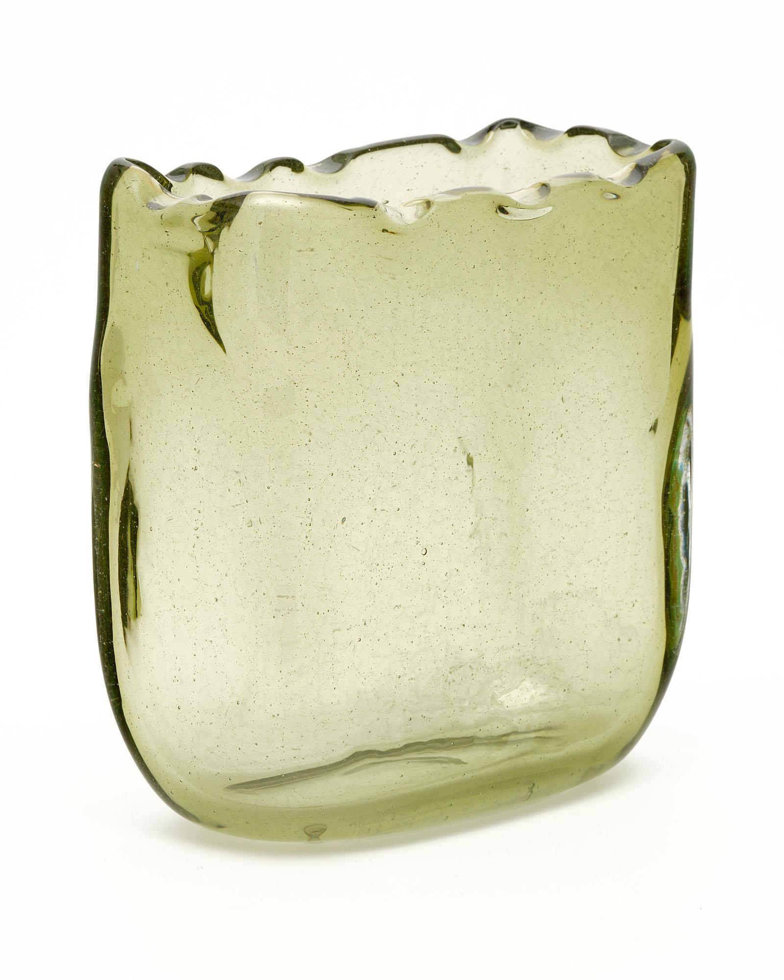 Vase from the Murano Island outside of Venice. This piece has an inorganic shape and a striking smoked blown glass coloring with shades of green. It is hand-crafted.