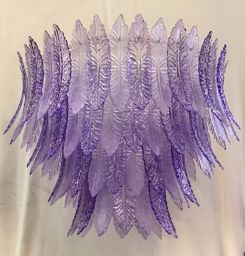 Riot of leaves, from an elegant double violet color, one transparent violet leaf and one satin violet. Very nice vivid, rich and original color.

White iron structure with all around the leaves in Murano glass, of violet color. The leaf has a curved