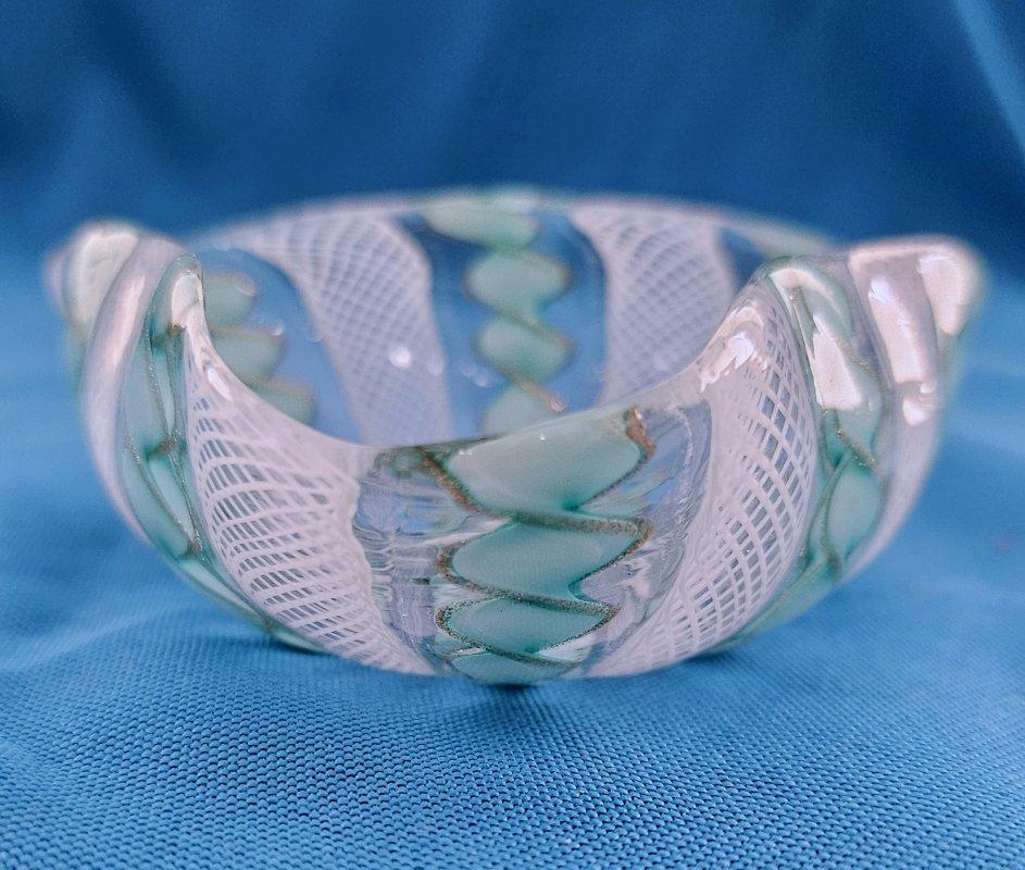 Green, White, Copper Murano Glass Zanfirico Latticino Glass Bowl/Trinket Dish.
One of the smaller designs, it measures about 3