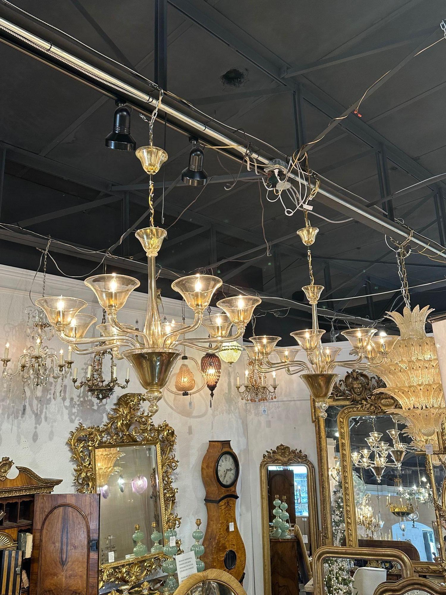 Modern Murano gold glass 8-arm chandelier. Circa 2000. The chandelier has been professionally re-wired, cleaned and is ready to hang. Includes matching chain and canopy.