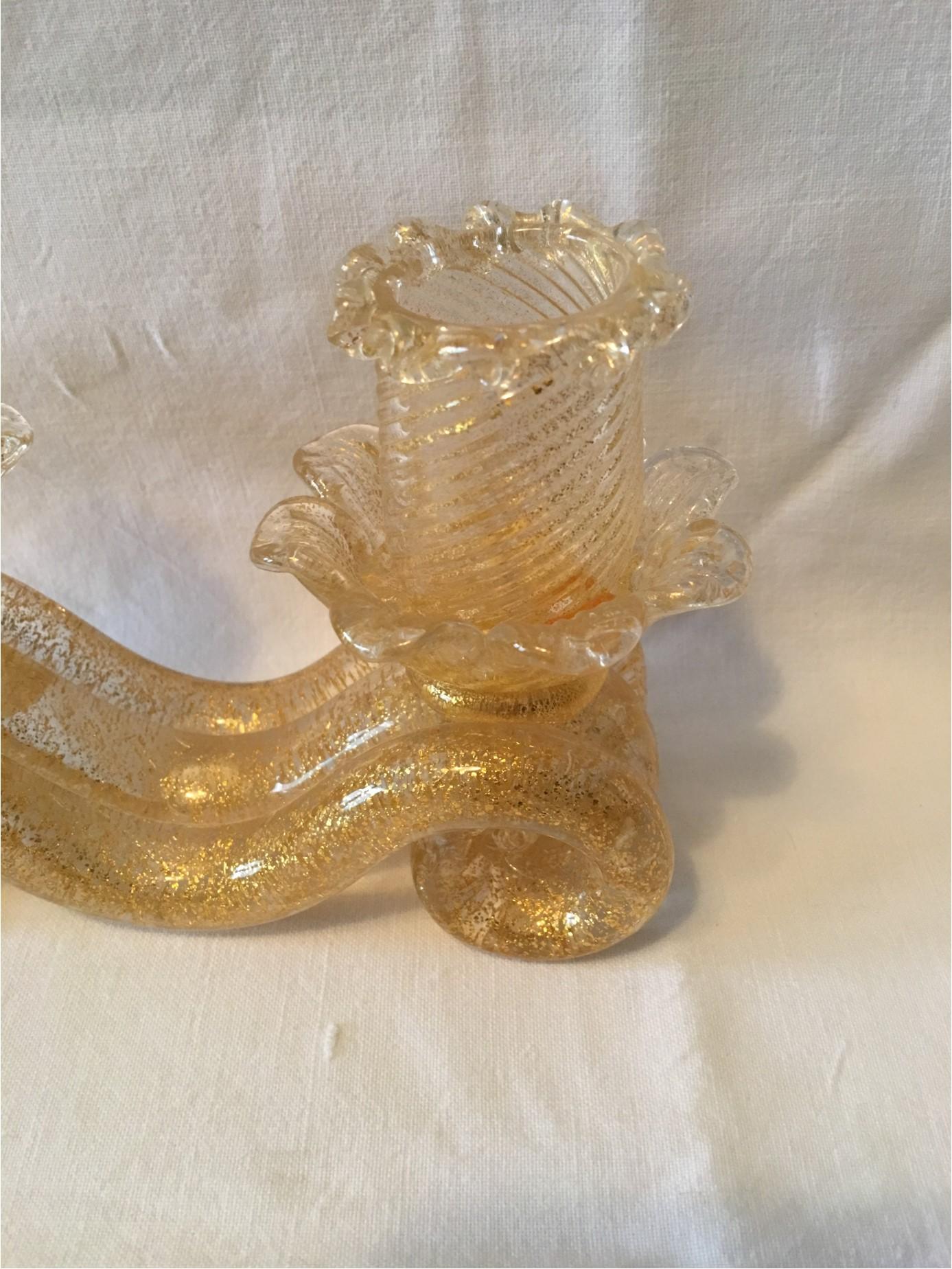 From the 1950s a wonderful Murano gold flake glass candleholder. From the styling of Barovier e Toso ! Lovely item. Molto Bello indeed!