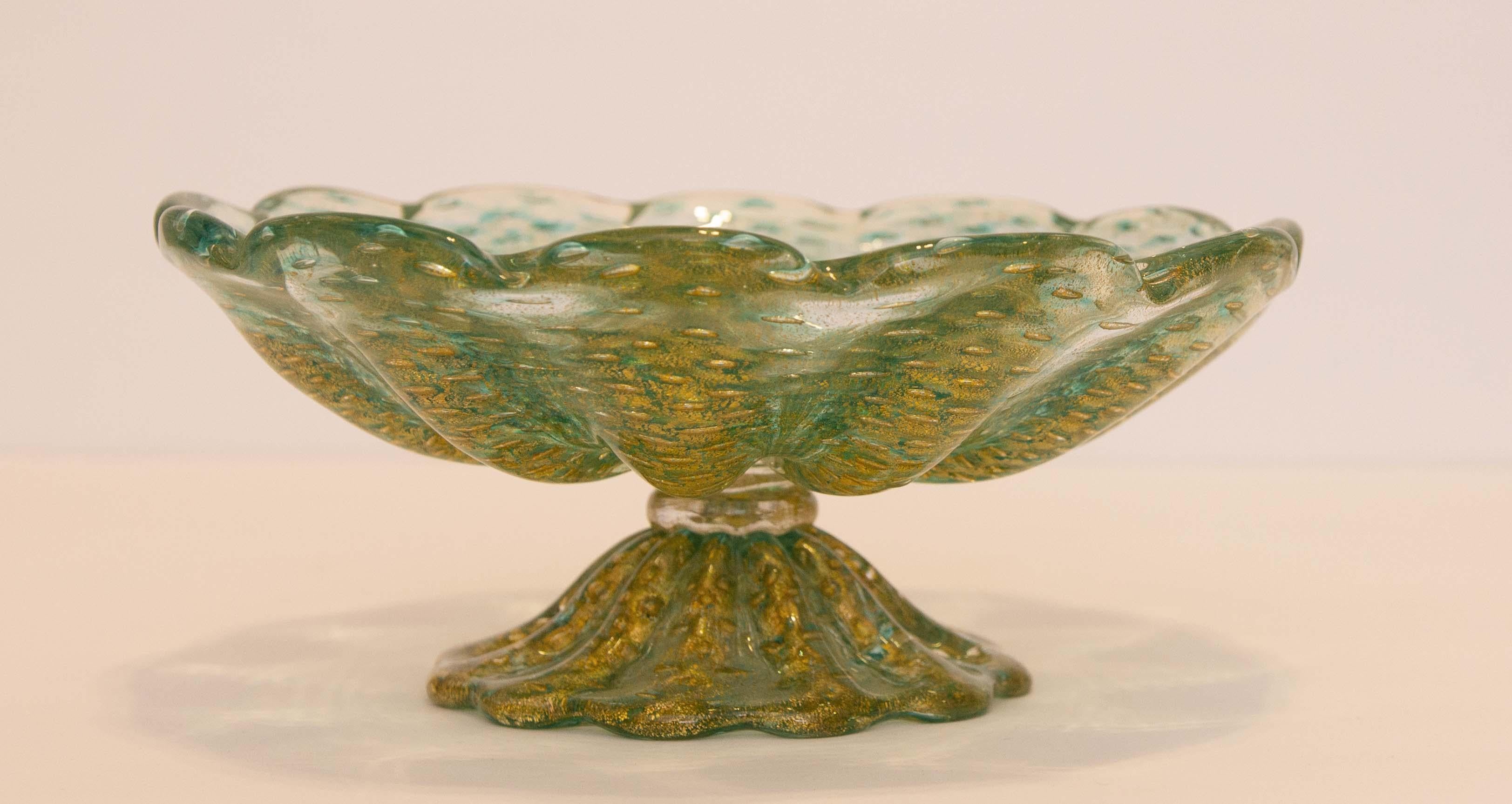 Murano glass compote. Clear and aquamarine glass with lots of gold flecks. Vintage mid 20th century. Attributed to Ercole Barovier Toso.


