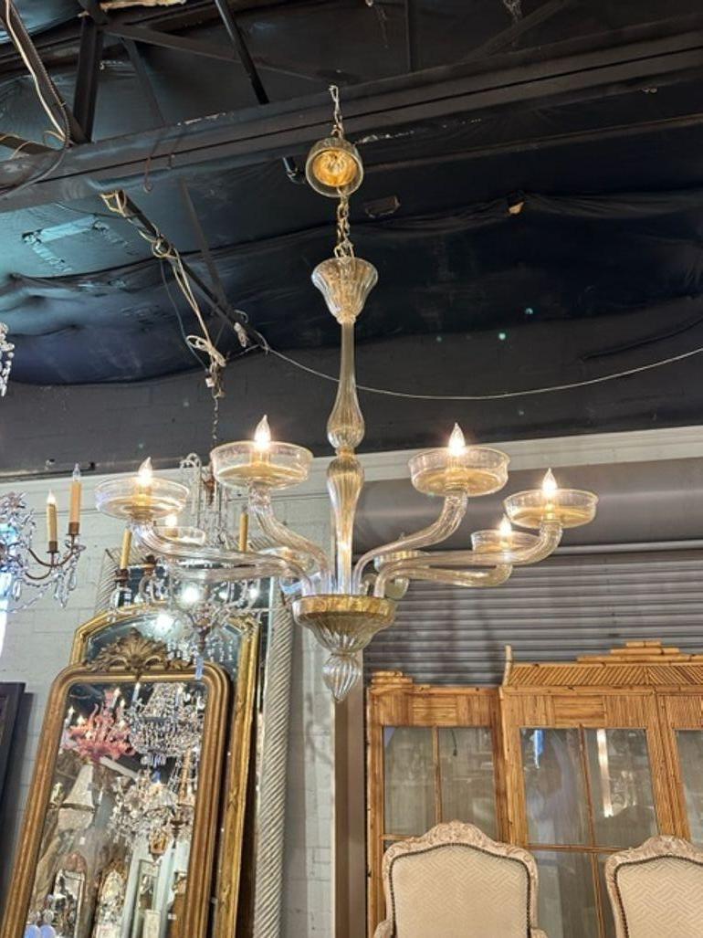 Modern Murano gold glass 8-arm chandelier. The chandelier has been professionally rewired, comes with matching chain and canopy. It is ready to hang!