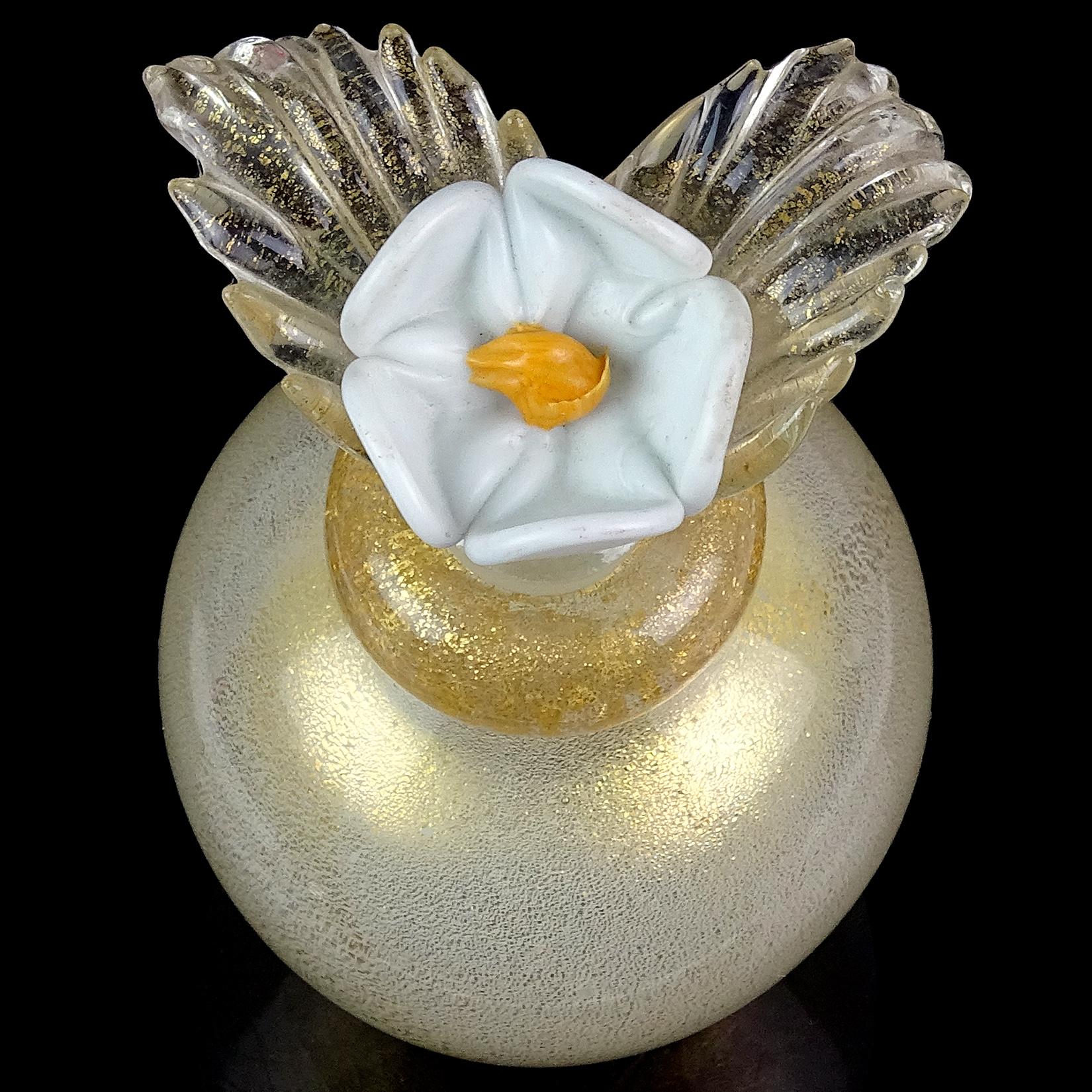 perfume bottle with flower on top