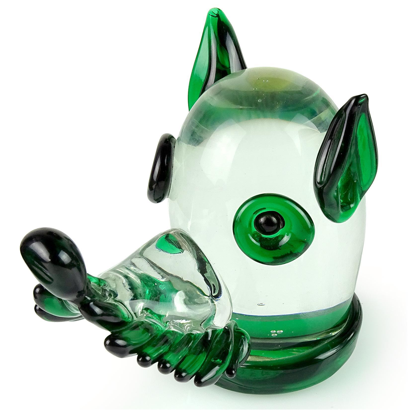 Priced per item (3 available as shown). Cute vintage Murano hand blown green and clear Italian art glass puppy dog head sculpture or paperweight. Documented to the Fratelli Toso company. Believe it is a Terrier or Scotty dog. The head has a tied