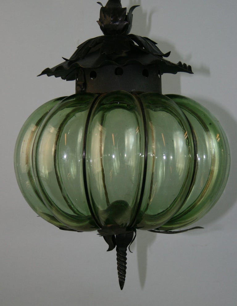 Murano green glass blown into metal frame
Rewired takes one 60 watt Edison Based bulb
Supplied with 3 feet chain and canopy.