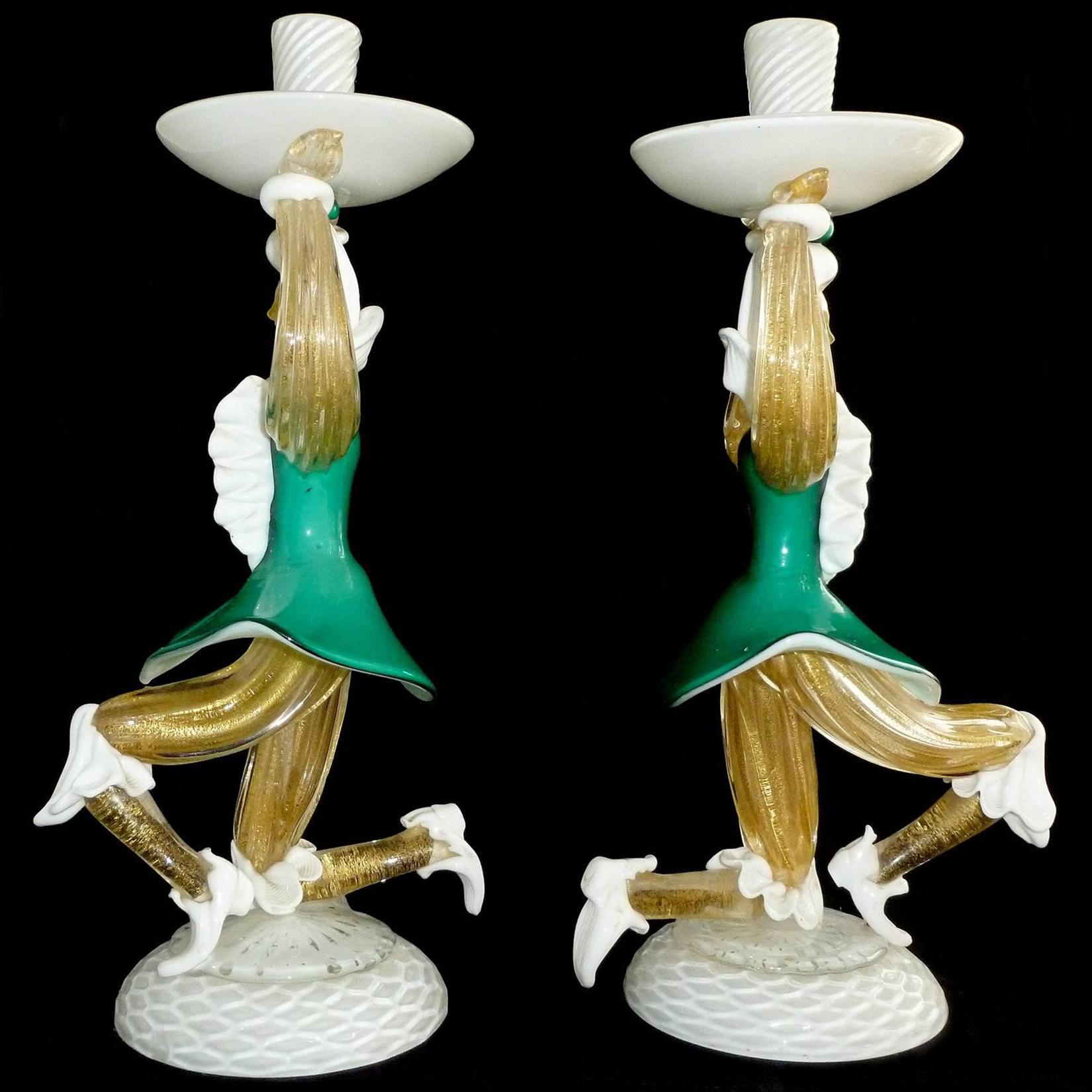 Beautiful pair of large vintage Murano hand blown white, gold flecks and teal green Italian art glass figural candlestick sculptures of Venetian gentleman. They are a true matched pair, and created in the manner of the Barovier & Toso company. Both