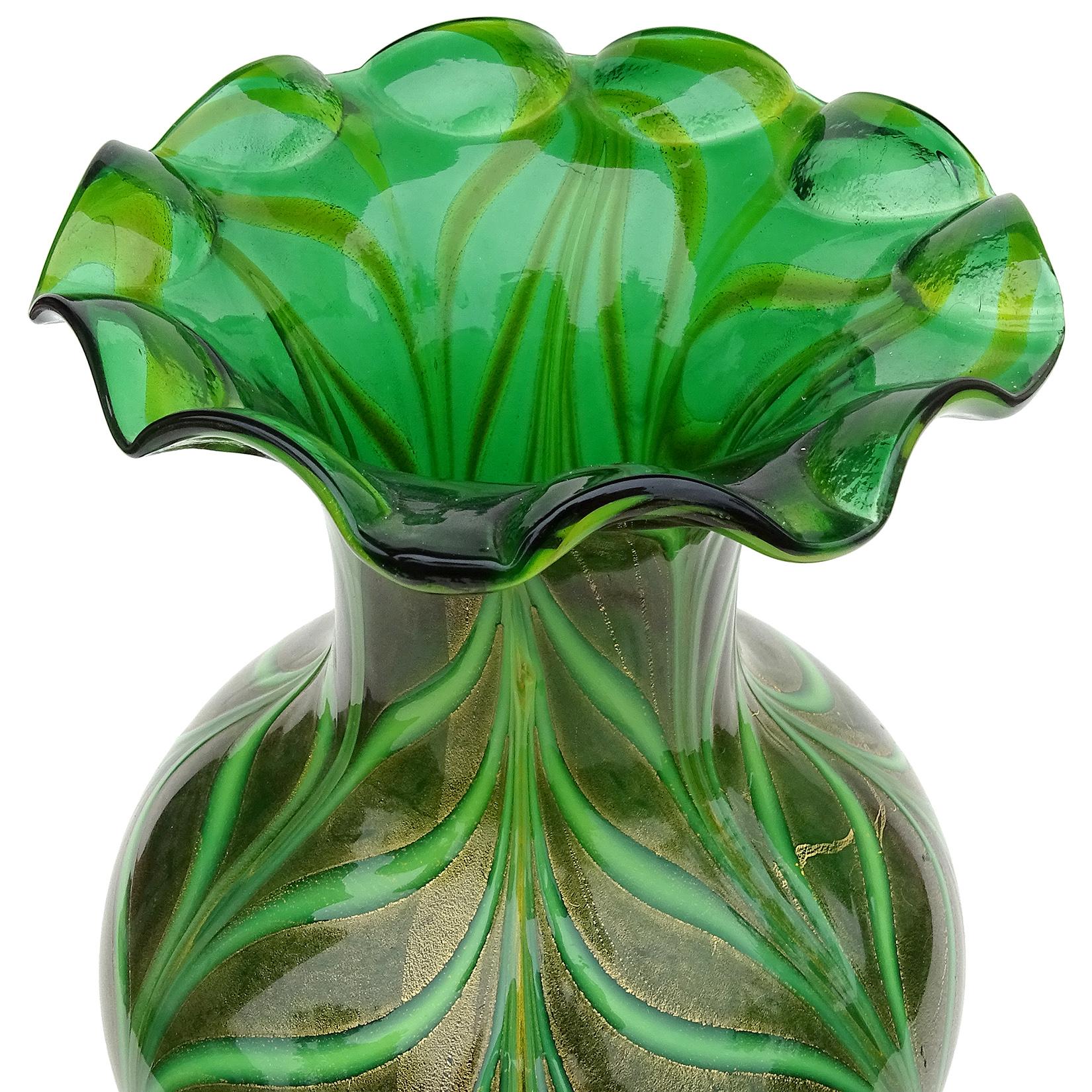 Beautiful vintage Murano hand blown dark and bright green, with gold flecks, Italian art glass flower vase. The vase is created in a Venetian style, in the manner of the Fratelli Toso and Salviati companies. Has a pulled feather or 