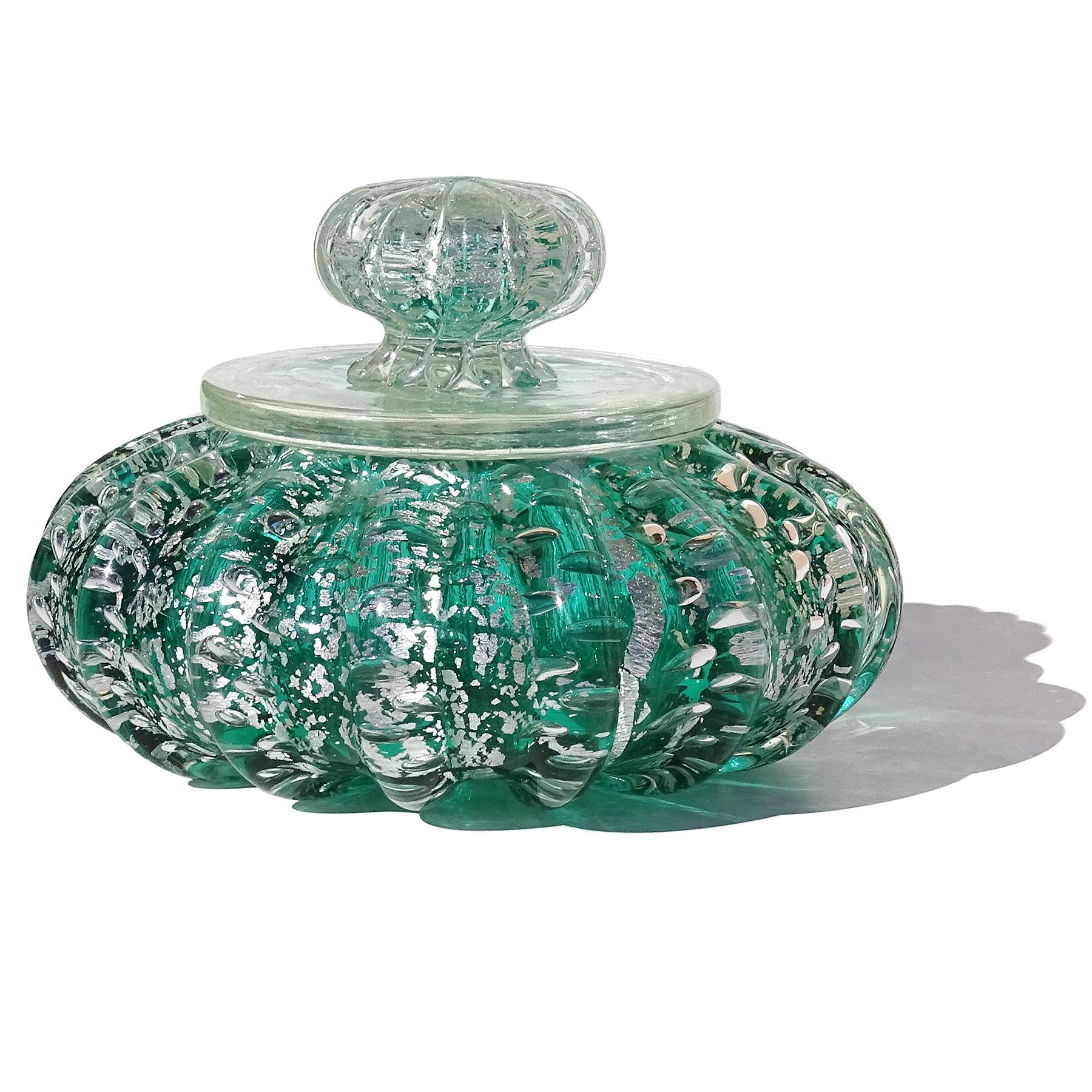 Beautiful and large, vintage Murano hand blown Sommerso green, silver flecks and controlled bubbles Italian art glass powder or jewelry box. Created in the manner of the Barovier e Toso company. The lidded jar has a ribbed surface, with 
