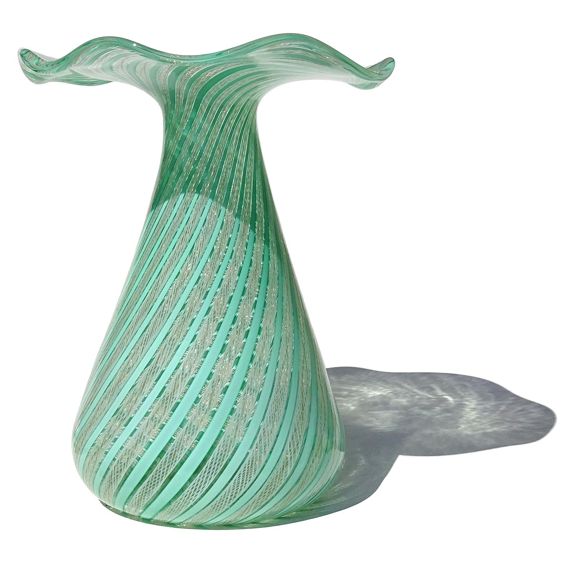 Beautiful, and large, vintage Murano hand blown green, white and aventurine Zanfirico ribbons Italian art glass sculptural flared rim flower vase. Created in the manner of the Dino Martens and the Fratelli Toso company. The vase has a very large and