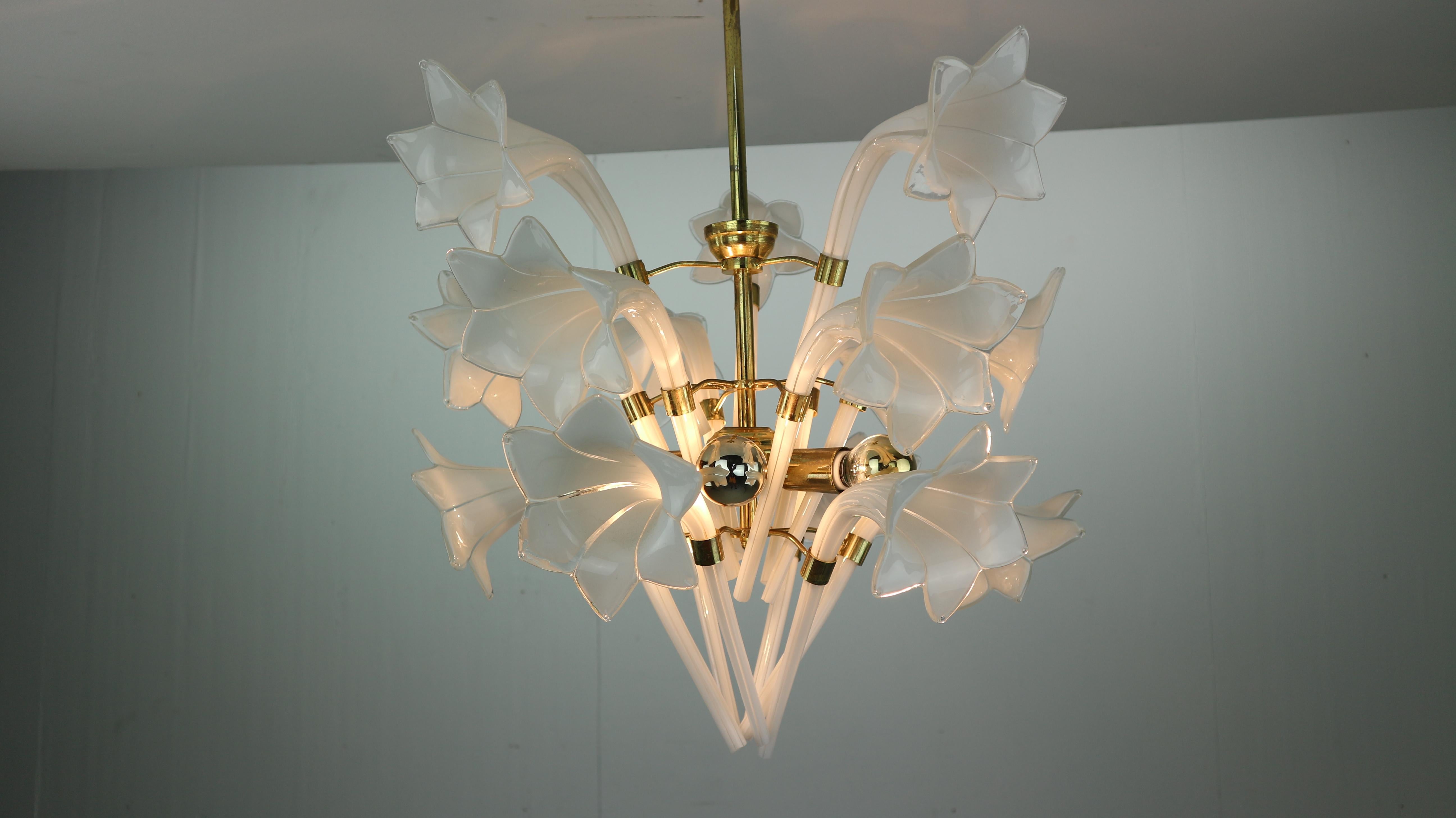 A beautiful Italian hanging lamp chandelier. The lamp is attributed to Franco Luce. The glass flowers and leaves are mouth-blown and hand-formed. The 12 glass flowers and 6 Calla leaves can be taken apart and mounted on a brass frame. The lamp has 6