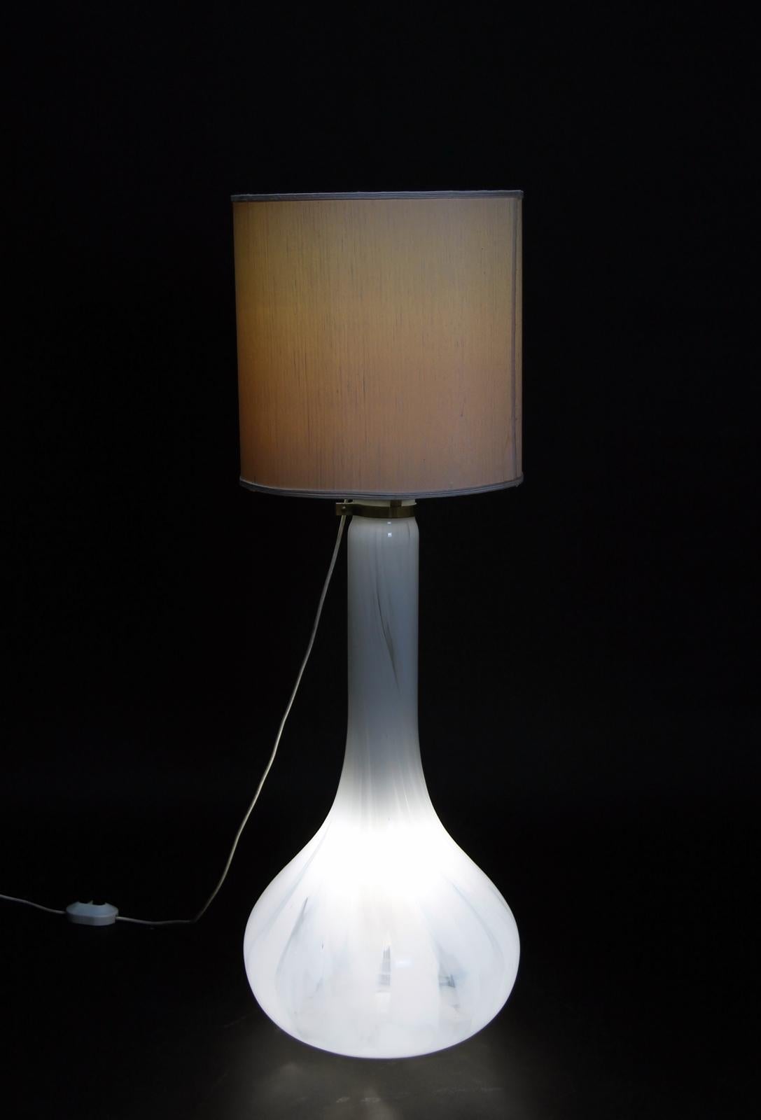 Stunning illuminated base Italian floor Lamp with polished brass fittings and beautifully hand blown Murano glass. Light wear consistent with age and use,
Minor signs of wear on the shade.
  
  