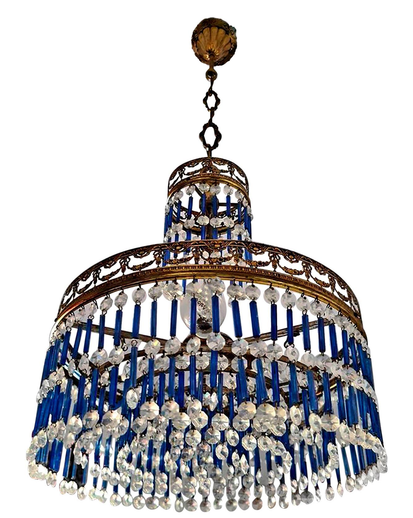 Fabulous Italian Murano Art Deco, blue glass drops and crystal 3-light gilt chandelier
Measures:
Diameter 13 in/ 33 cm
Height 38.5 in (chain 10 in) / 98 cm (chain 25 cm)
3-light bulbs E14/ good working condition.
Assembly required. Bulbs not