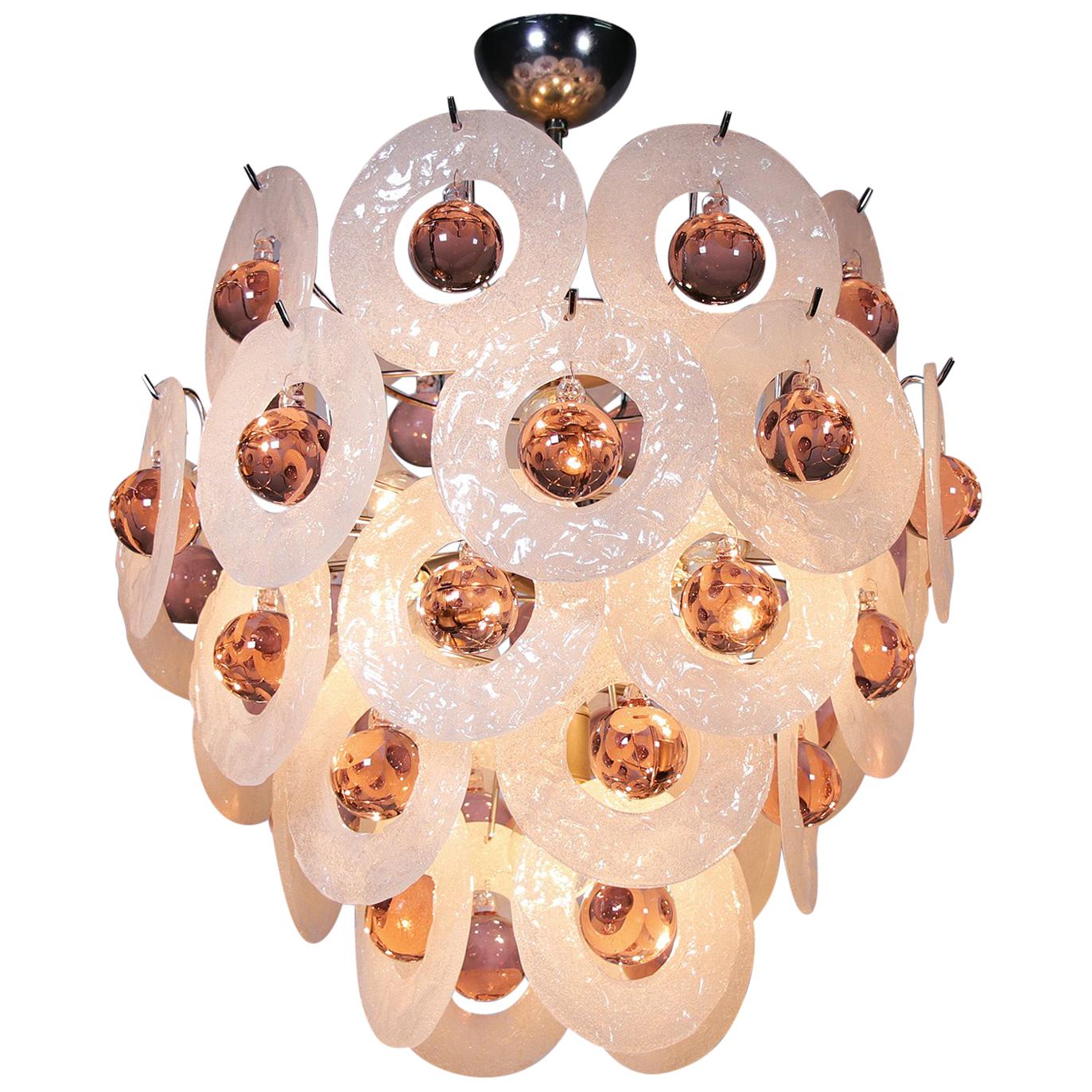 Elegant satellite chandelier with thirty-six white iced murano glass discs incl. pink murano glass balls on a chromed sputnik frame designed by Gino Vistosi. Chandelier illuminates beautifully and offers a lot of light. Gem from the time. With this