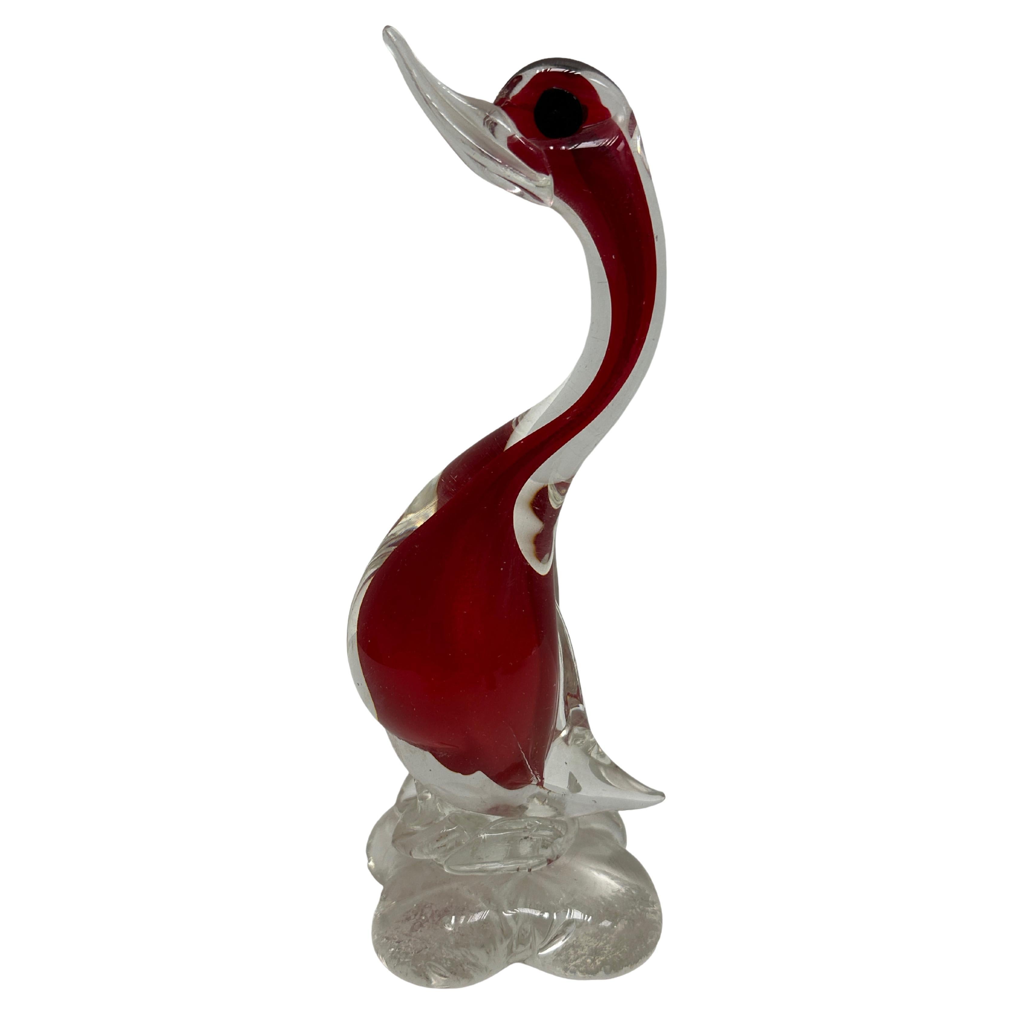 This stunning vintage Murano Italian art glass duck sculpture was purchased at an estate sale in Rovereto, Italy. It was made in the traditional Murano style, which is a centuries-old technique that requires great skill and expertise. The duck is