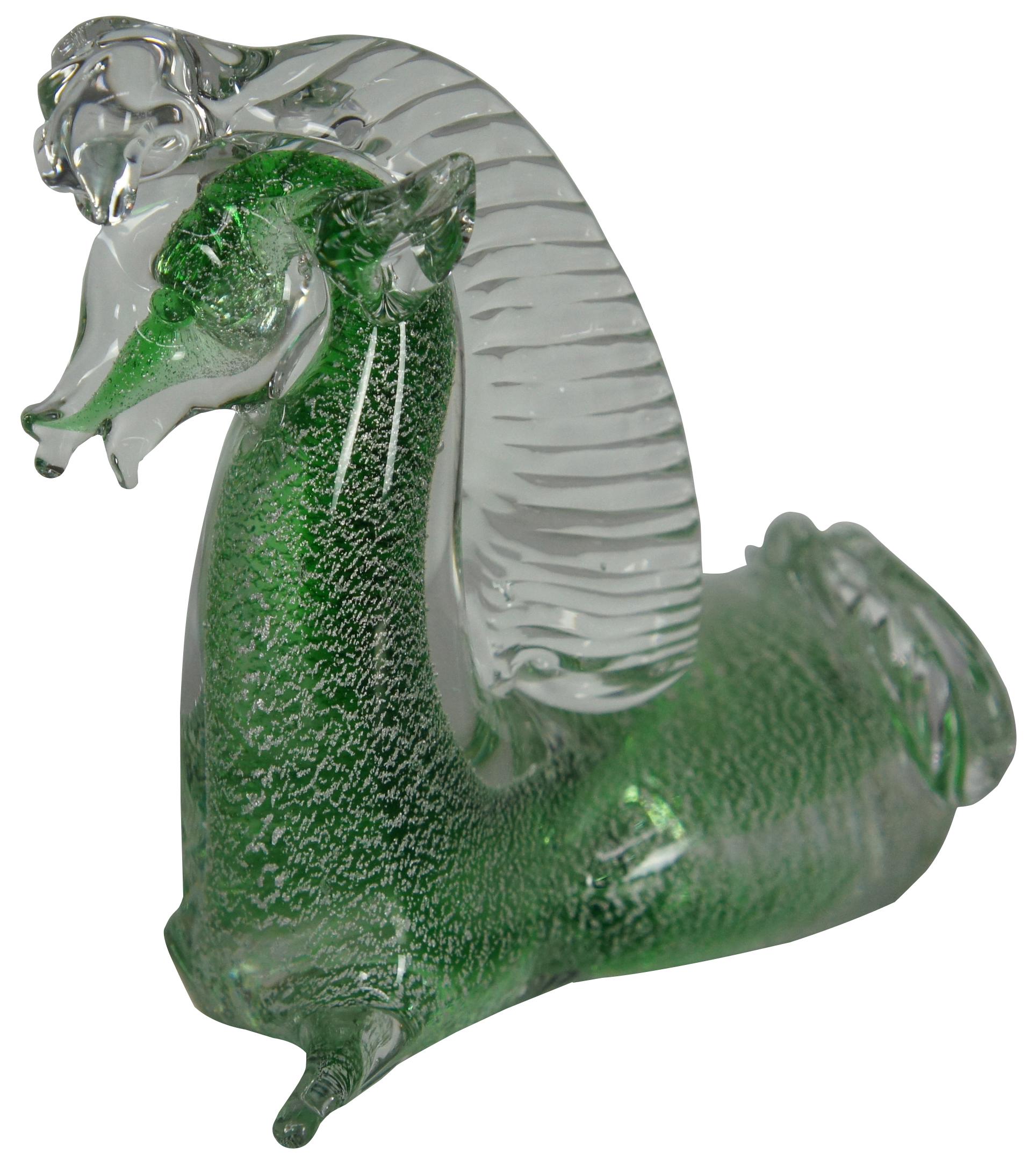 Hand blown Murano art glass figurine or paperweight in the shape of a green and white speckled kneeling or laying horse with transparent mane. Measure: 7