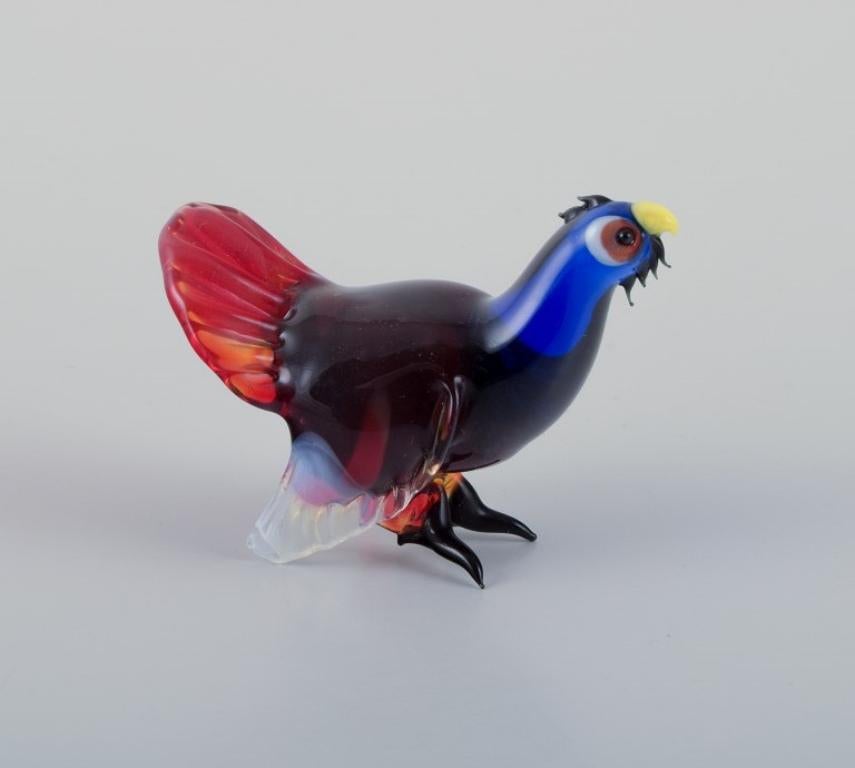 Milieu du XXe siècle Murano, Italie. Une collection de quatre figurines d'oiseaux miniatures en verre. en vente