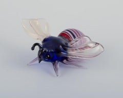 Murano, Italy. A collection of four miniature glass figurines of bees.