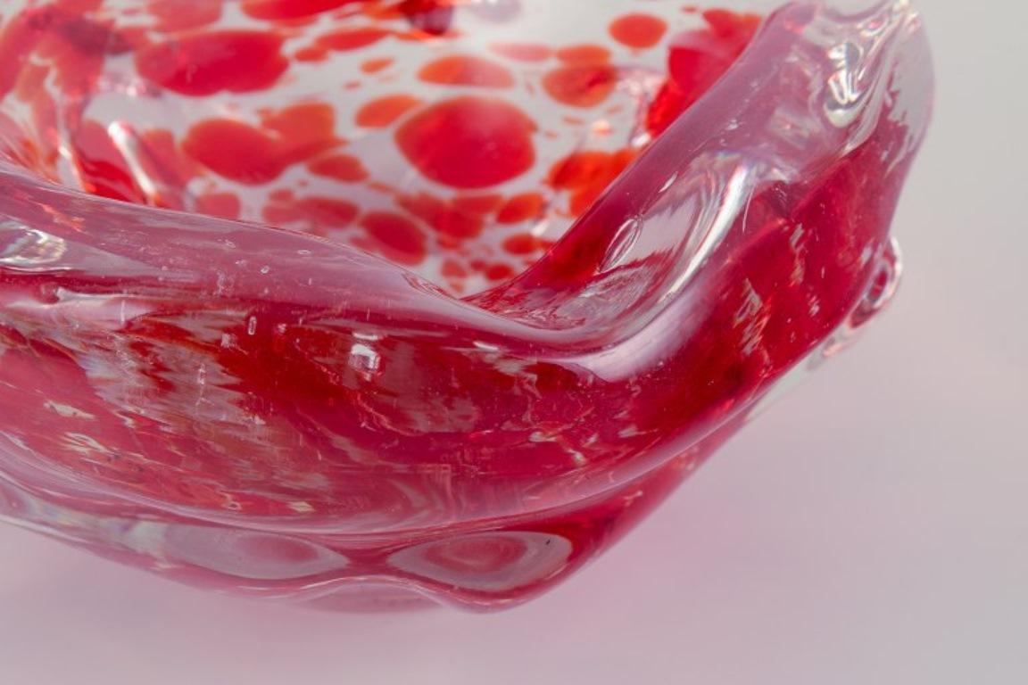 Mid-20th Century Murano, Italy. Art glass bowl. Clear and red glass with air bubbles inside. For Sale