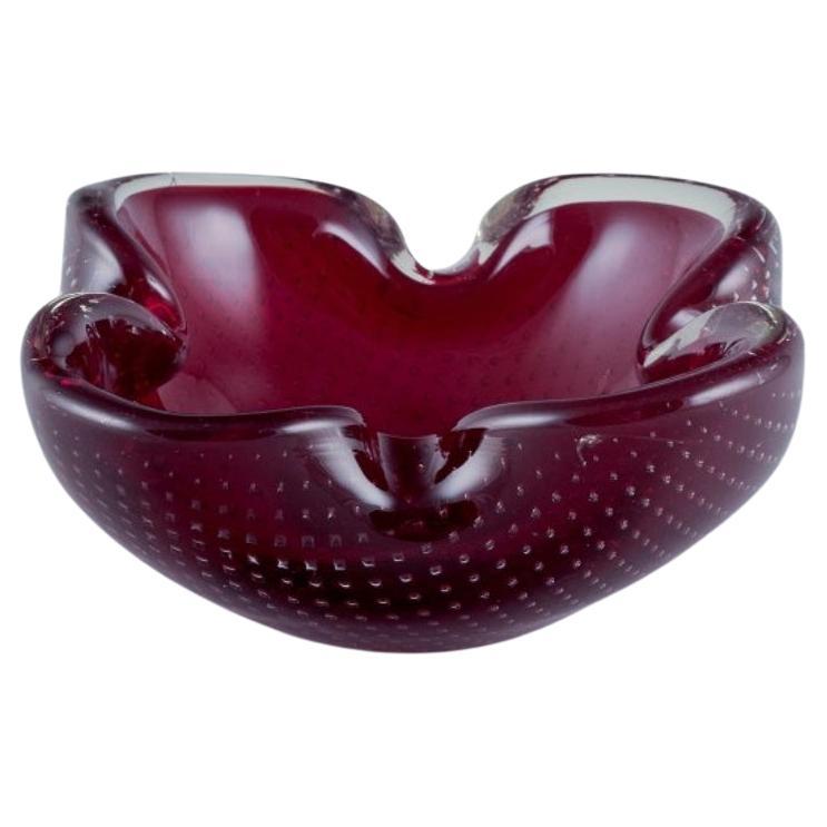 Murano, Italy. Art glass bowl in purple glass. Approx. 1960s/1970 For Sale