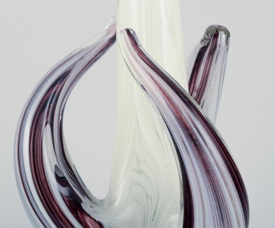 Italian Murano, Italy. Art glass sculpture in purple and white glass on clear glass base For Sale
