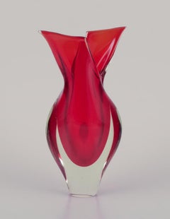 Murano, Italy. Art glass vase in clear and red glass. Modern form.