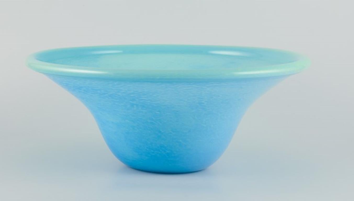 Murano, Italy, colossal mouth-blown unique glass bowl in turquoise tones.
1980s.
In perfect condition.
Dimensions: Diameter 37.8 cm, Height 15.2 cm.