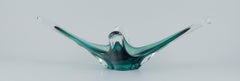 Murano, Italy. Large bowl in art glass. Clear and green glass.