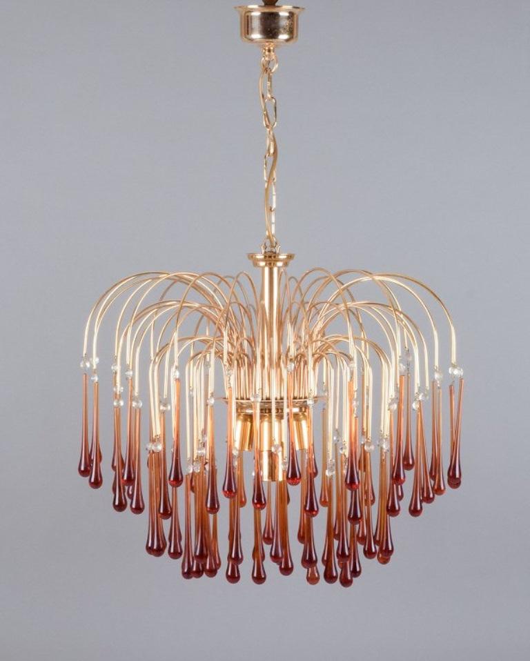 Murano, Italy. Large ceiling lamp in amber mouth-blown art glass, brass frame. Italian design. For seven bulbs.
1960s.
In perfect condition.
Dimensions: H 50.0 cm without suspension x D 60.0 cm.