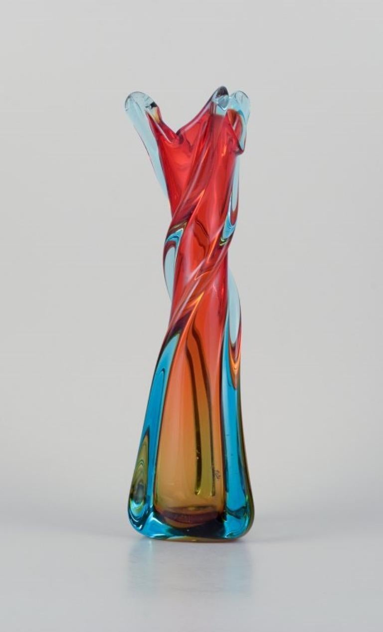 Modern Murano, Italy, large mouth-blown and twisted art glass vase in blue and red.