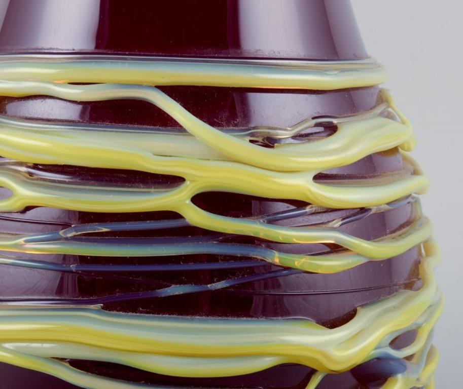 Late 20th Century Murano, Italy, large mouth-blown spaghetti vase in burgundy art glass. 1970s. For Sale