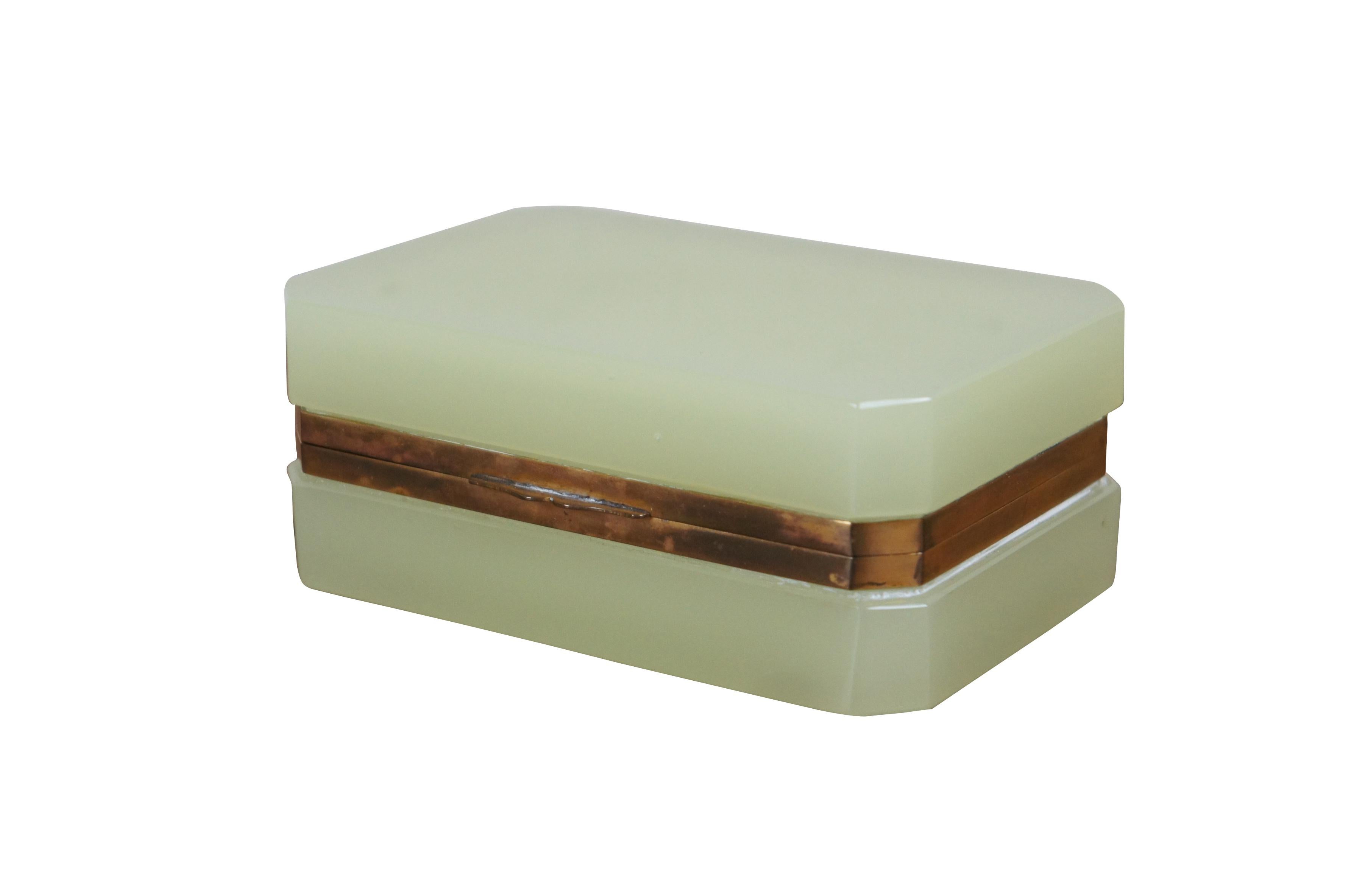 Impressive antique opaline / uranium / vaseline glass trinket jewelry keepsake box. Rectangular form with cut corners, plain brass band around interior rim. Murano Glass - Made in Italy.  Soft jade green / cenedese. Glows green in UV
