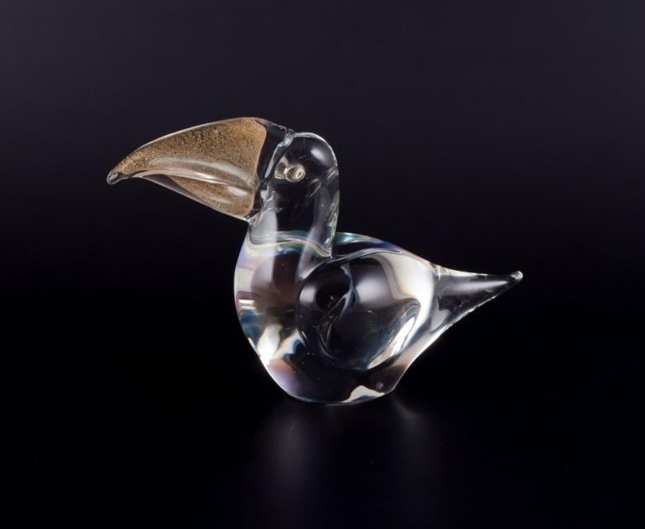 Murano, Italy. Small art glass sculpture of a toucan in clear glass with a gold-colored glass beak.
Approximately 1970.
Perfect condition.
Dimensions: L 17.0 cm x W 6.0 cm x H 11.0 cm.