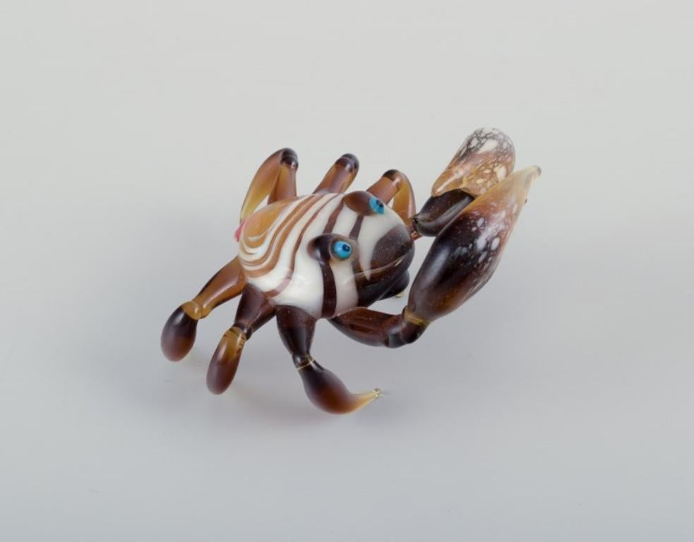 Mid-20th Century Murano, Italy. Three miniature glass animal figurines. Two seals and a crab. For Sale